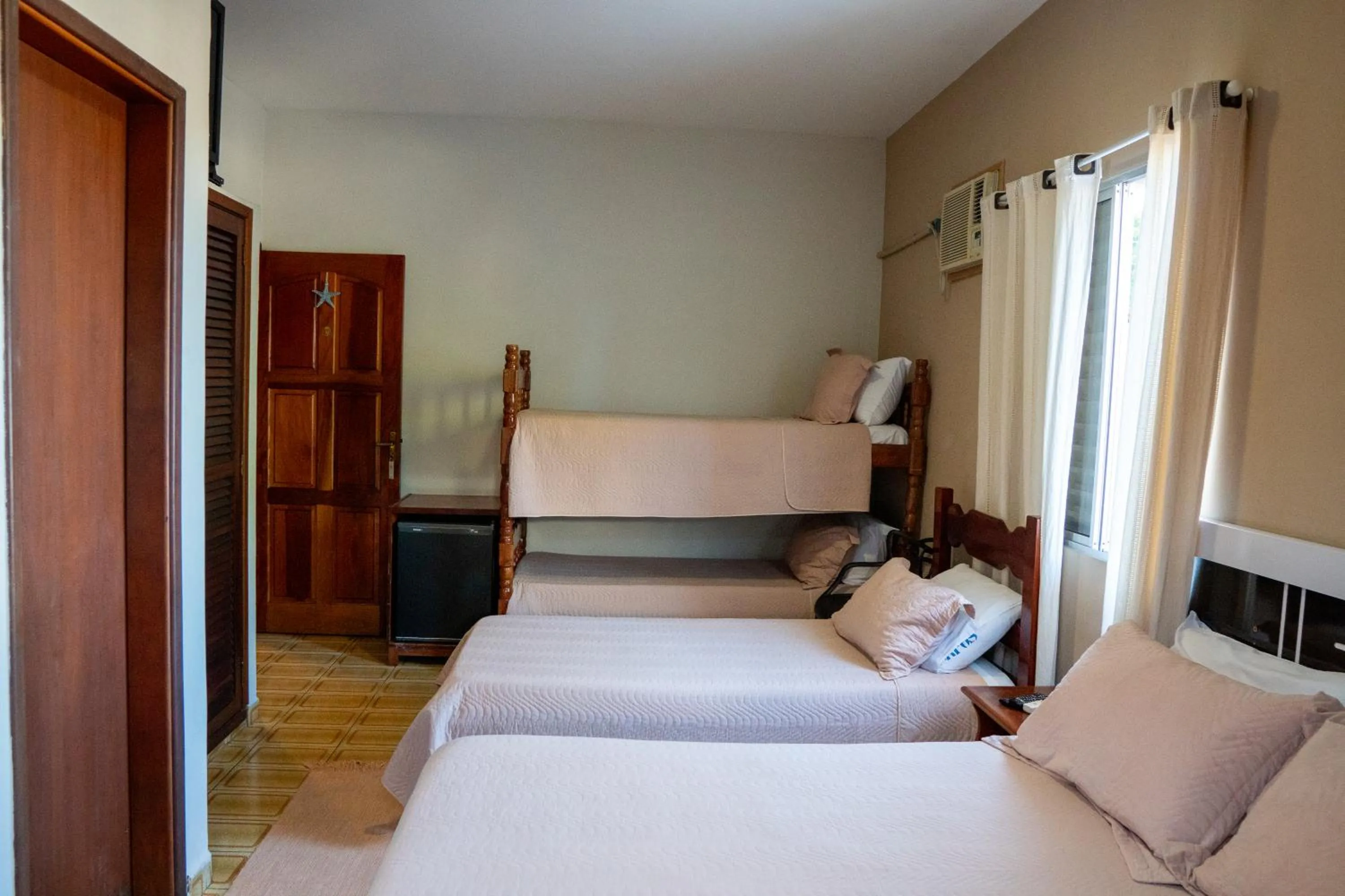 Bed in Pousada Amanhecer do Itaguá