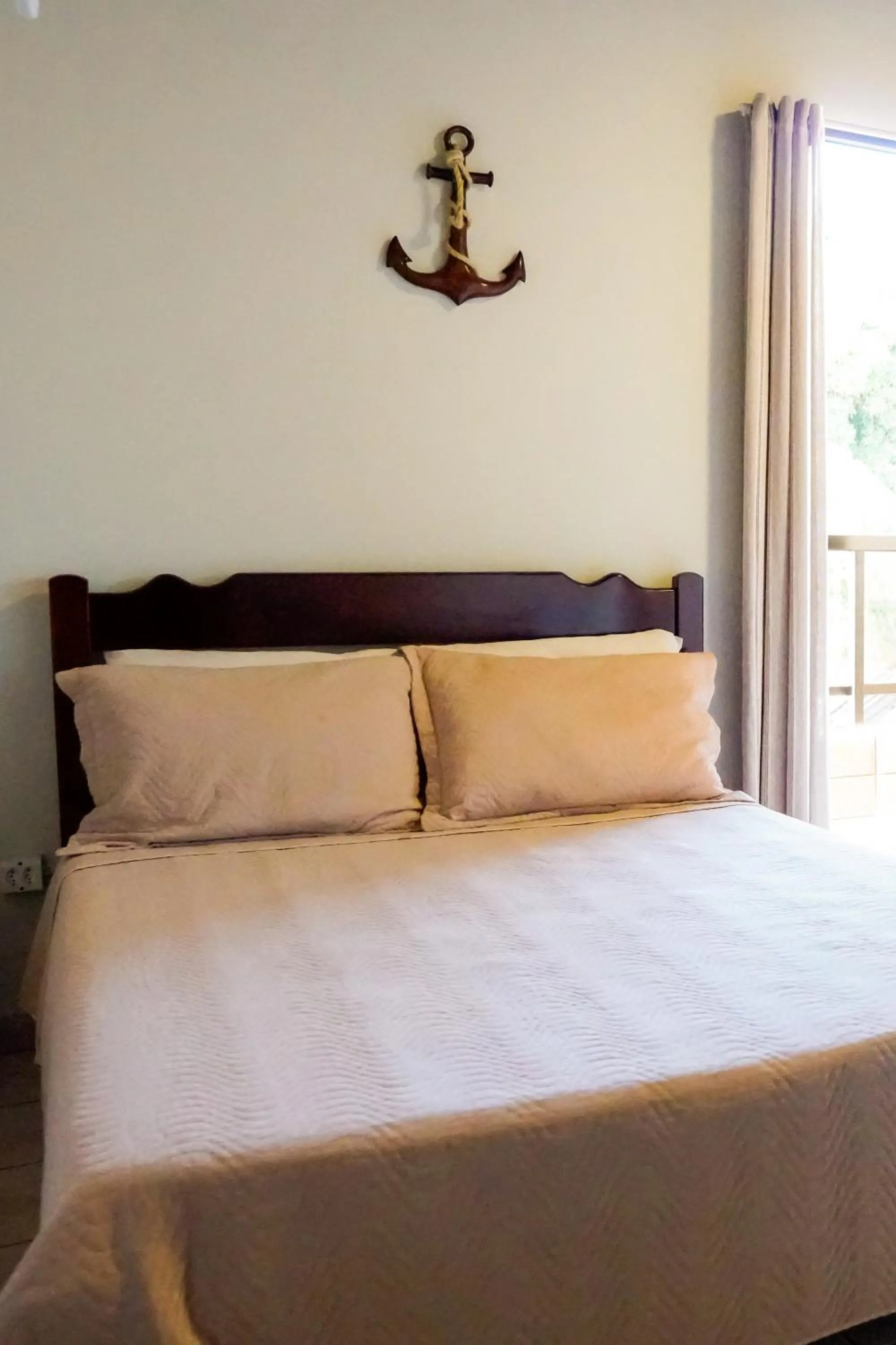 Bed in Pousada Amanhecer do Itaguá