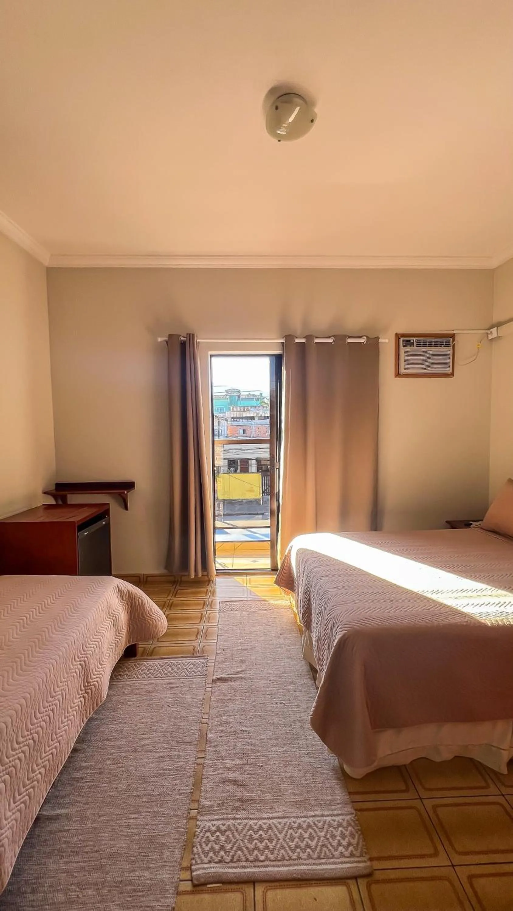 Bed in Pousada Amanhecer do Itaguá