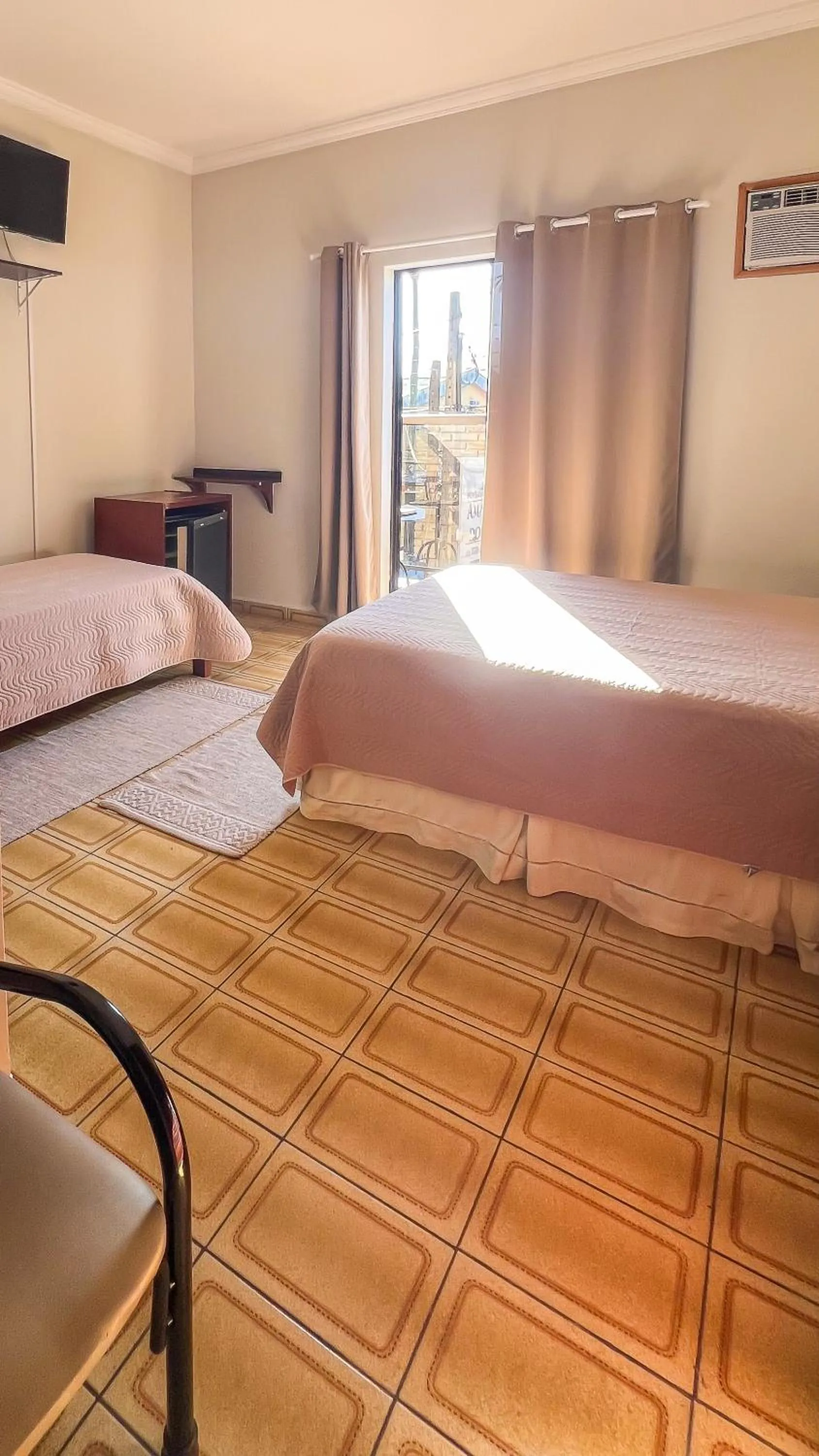 TV and multimedia in Pousada Amanhecer do Itaguá