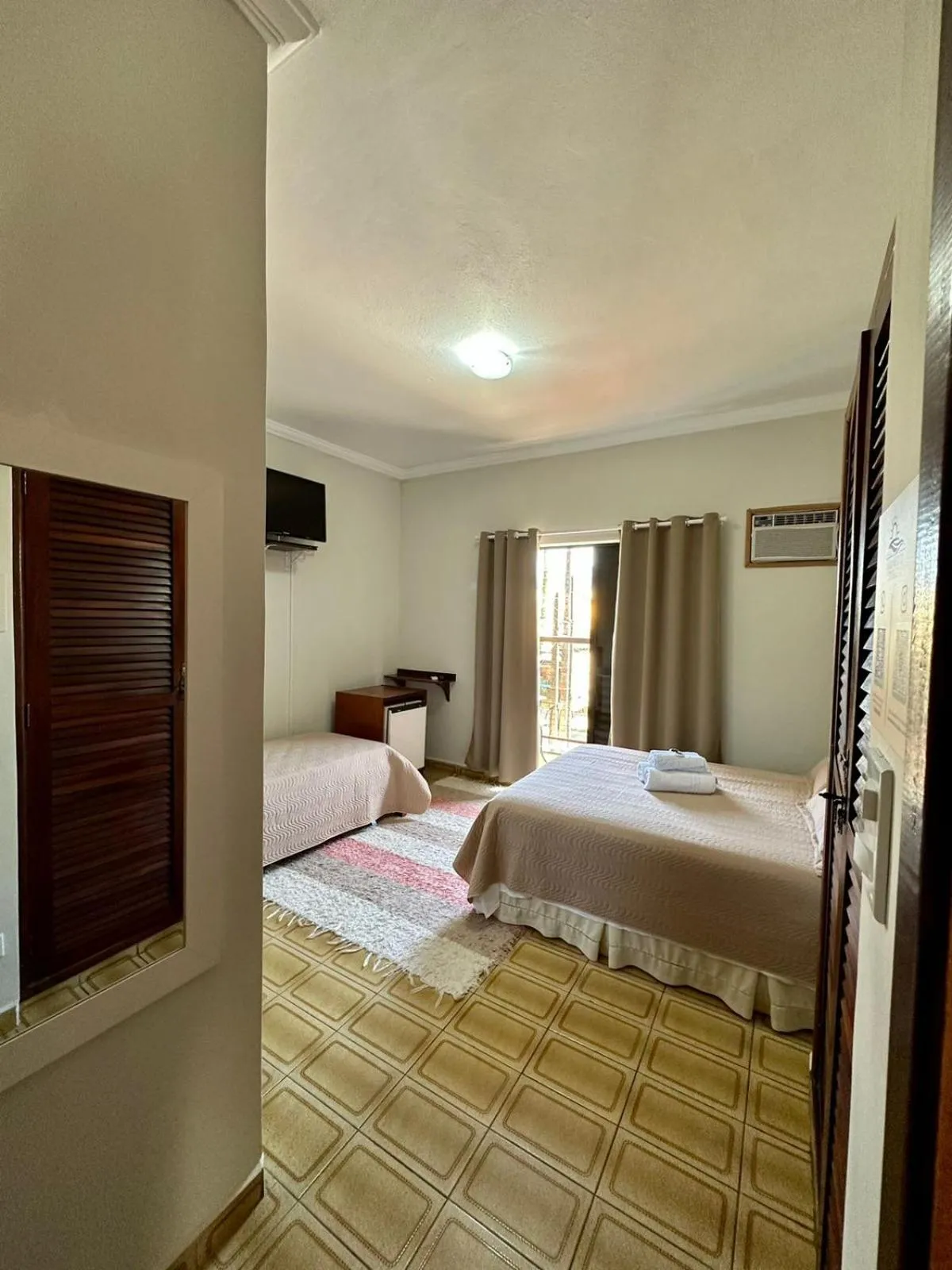 Bed in Pousada Amanhecer do Itaguá