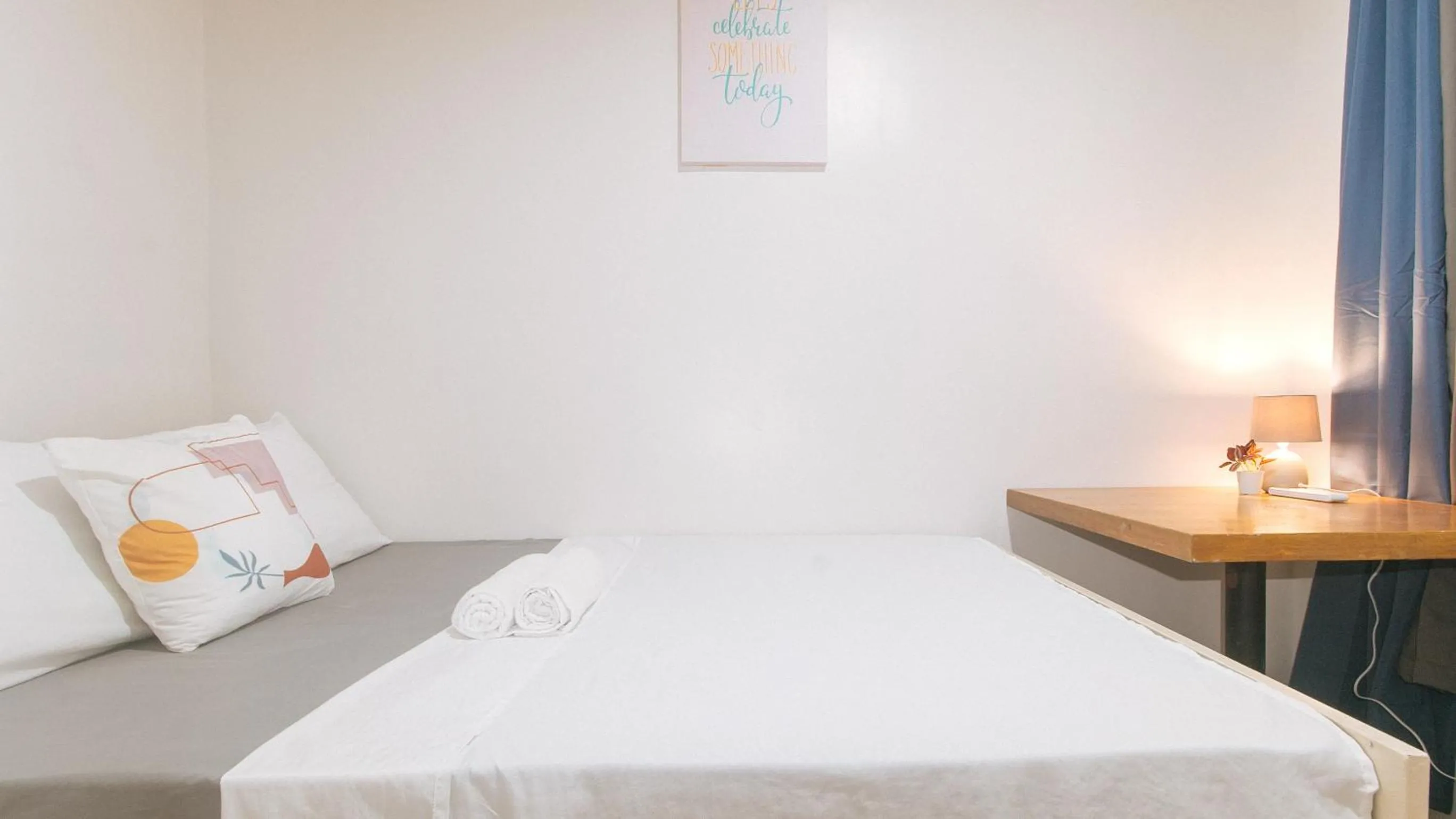 Bed in Cozy Cove Inn by RedDoorz