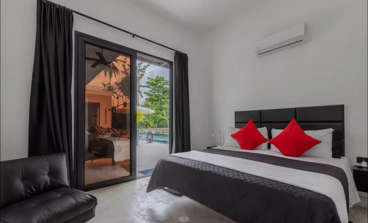 Bed in Casa Black and White Frente al Mar