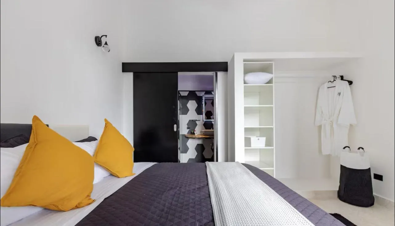 Bed in Casa Black and White Frente al Mar