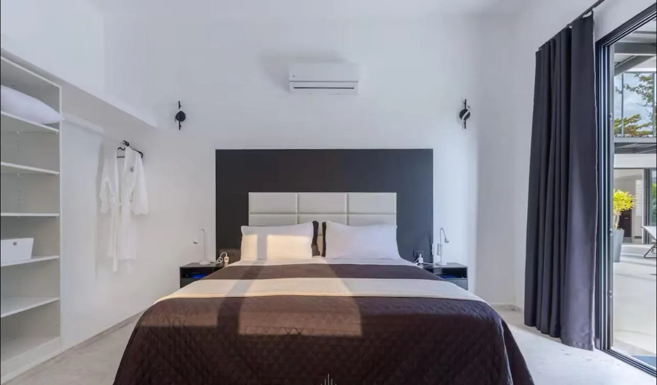 Bed in Casa Black and White Frente al Mar
