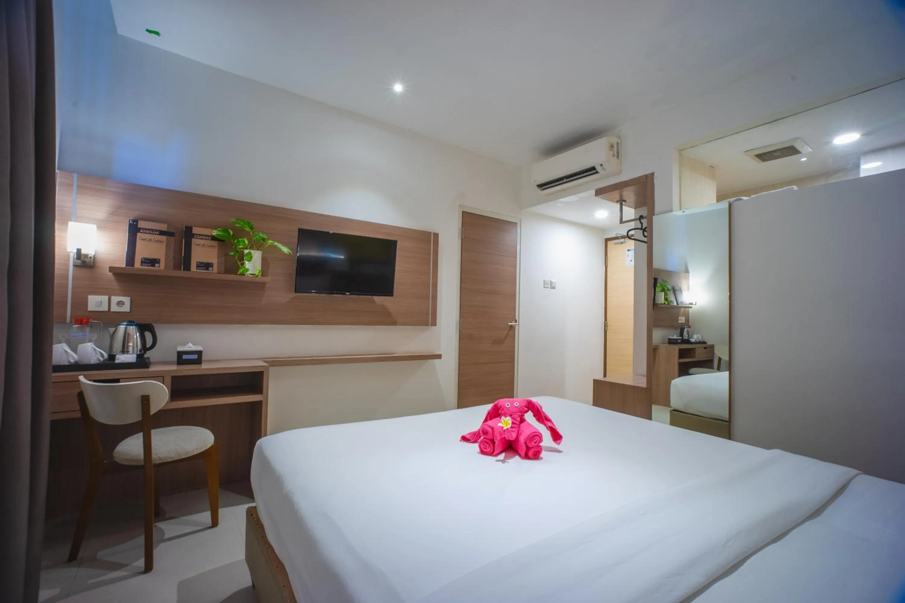 Bed in Triizz Hotel Semarang