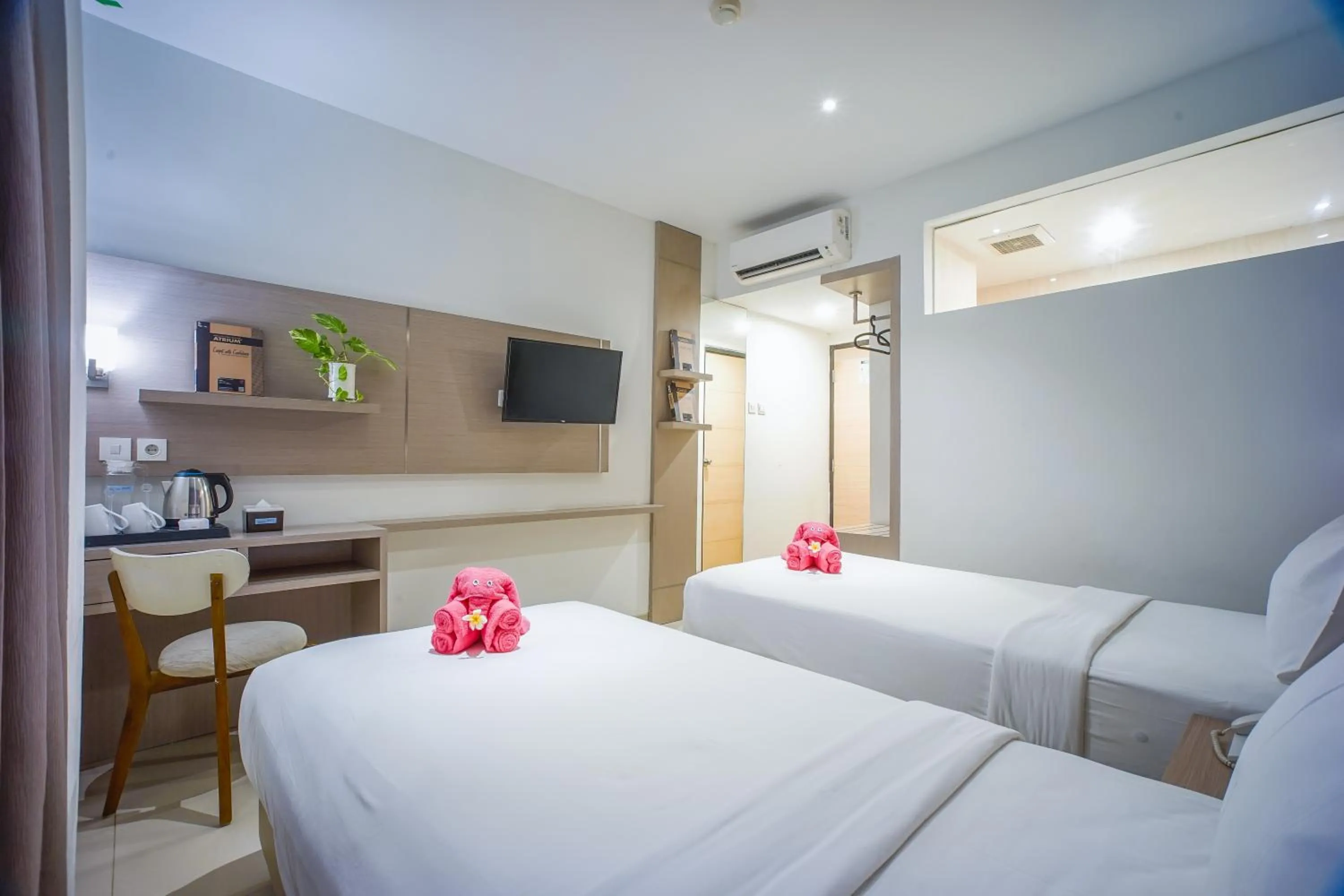 Bed in Triizz Hotel Semarang