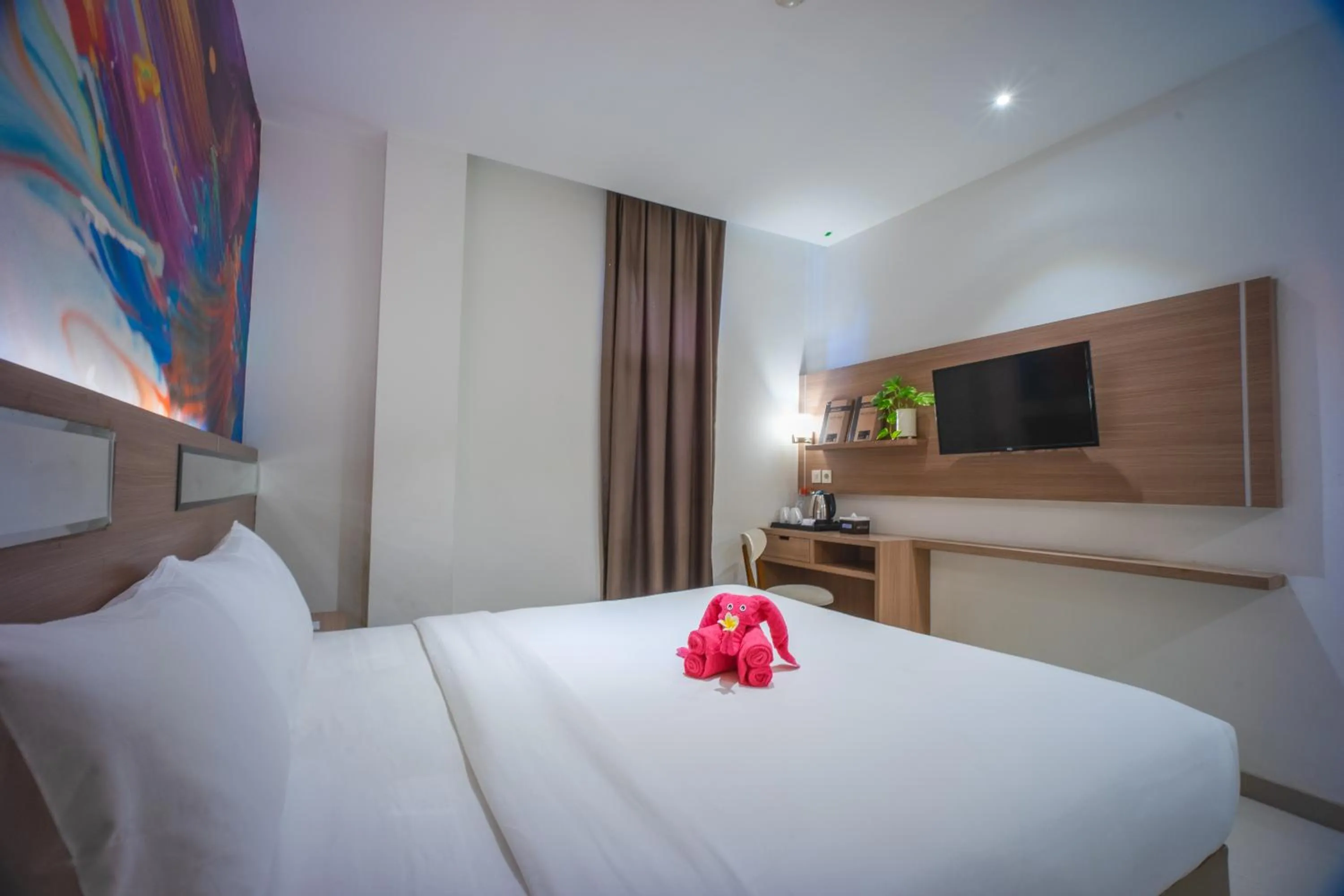 Bed in Triizz Hotel Semarang