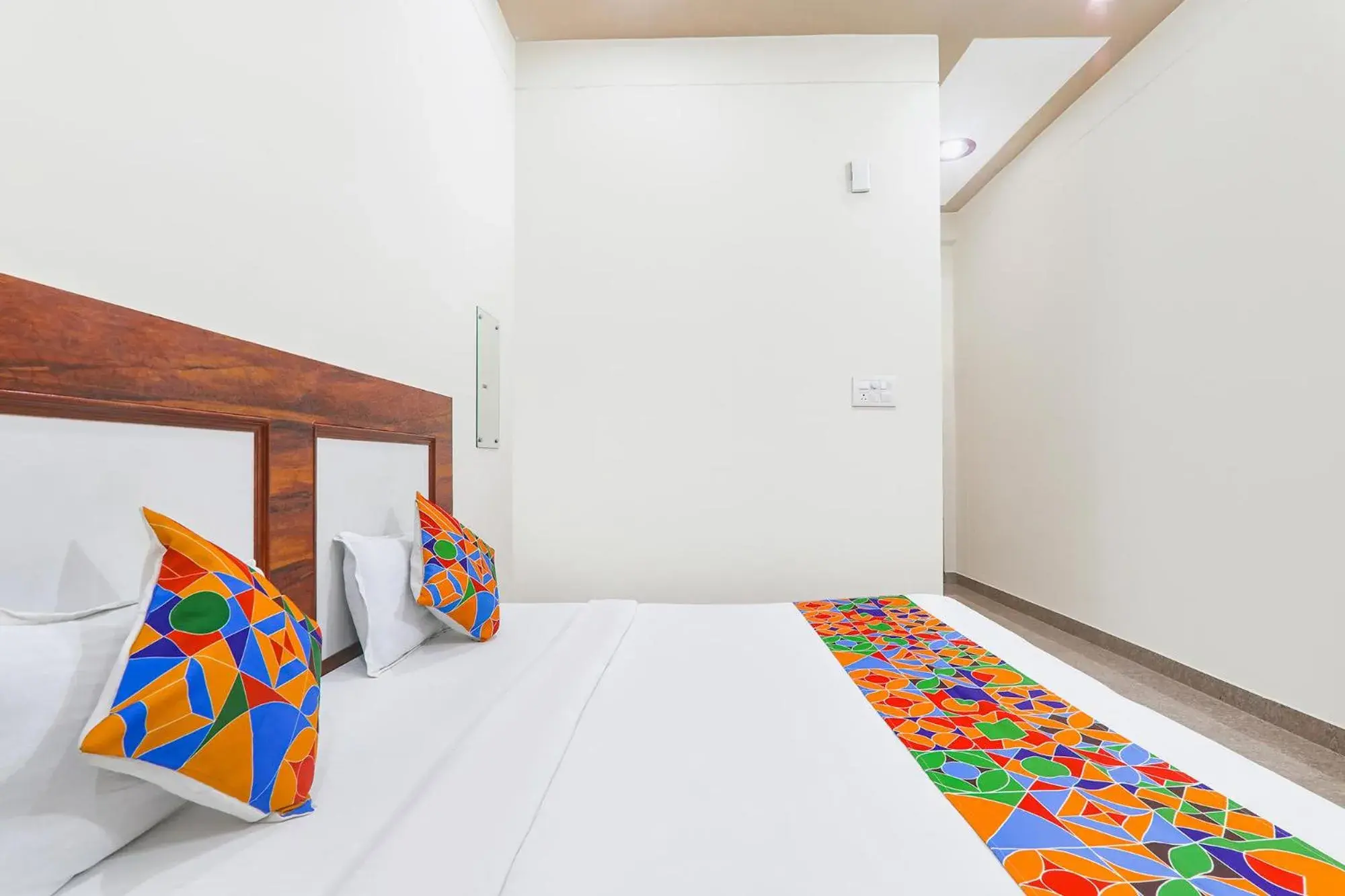 Bed in FabHotel Shree Venkatesh Nileyam Bed in FabHotel Shree Venkatesh Nileyam
