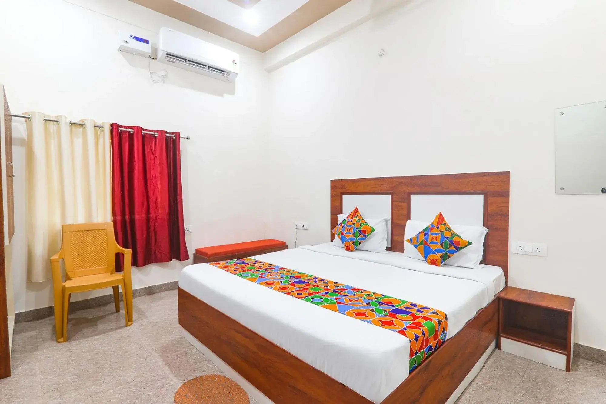 Bed in FabHotel Shree Venkatesh Nileyam Bed in FabHotel Shree Venkatesh Nileyam