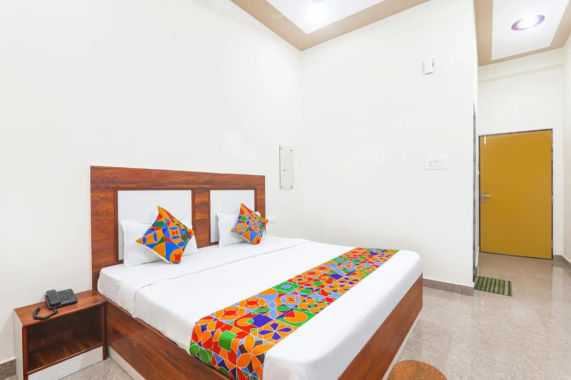Bed in FabHotel Shree Venkatesh Nileyam Bed in FabHotel Shree Venkatesh Nileyam