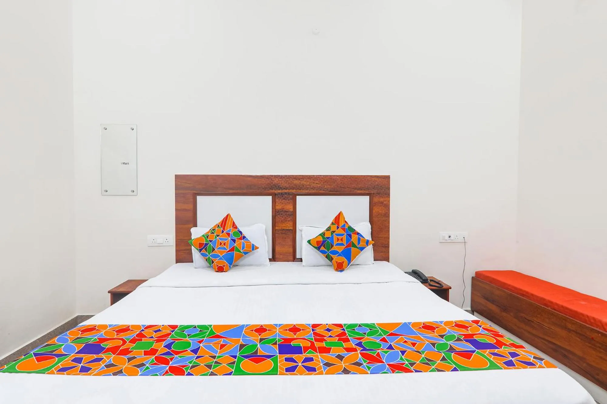 Bed in FabHotel Shree Venkatesh Nileyam