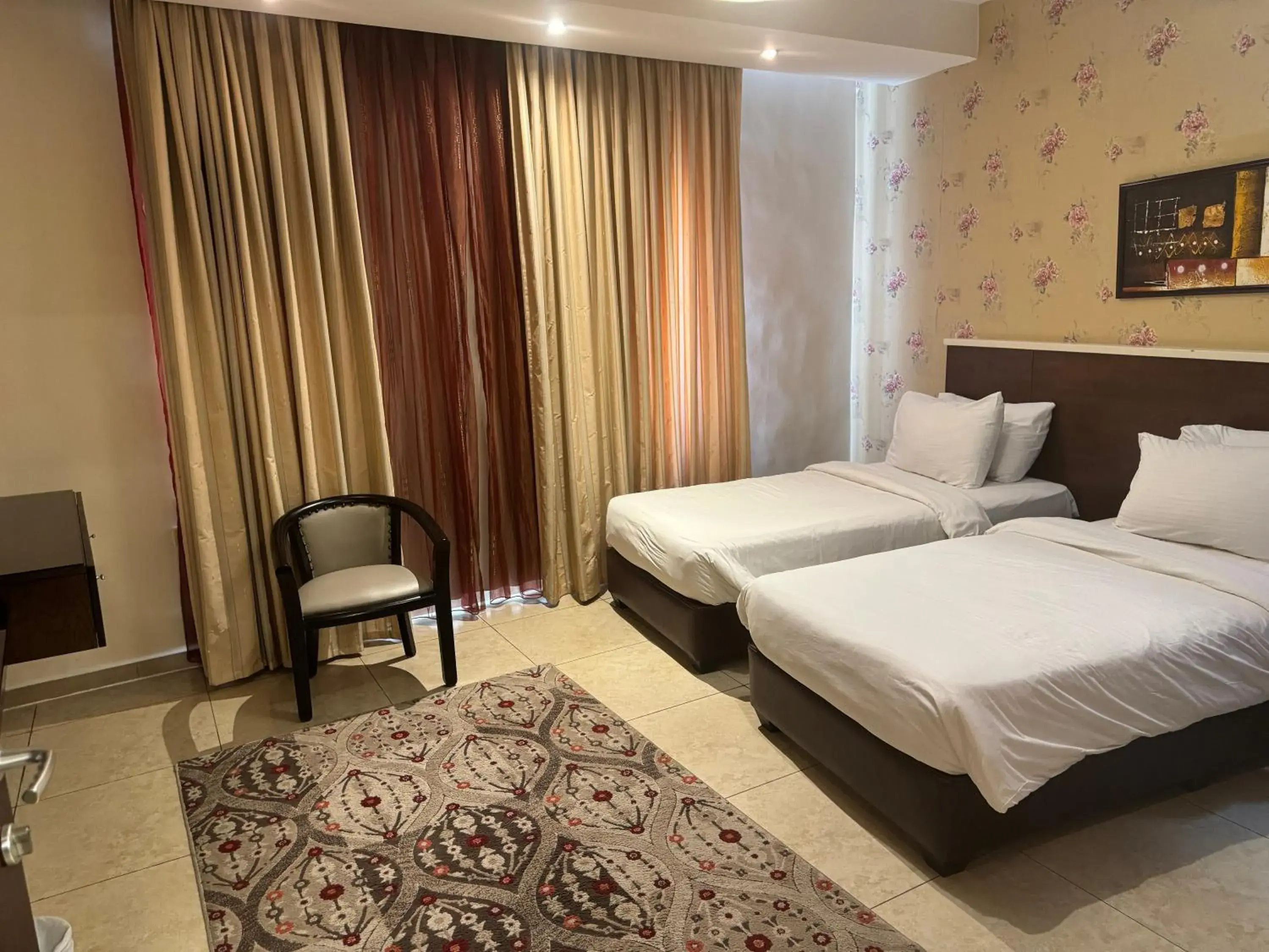 Bed in City Rose Hotel Suites Bed in City Rose Hotel Suites