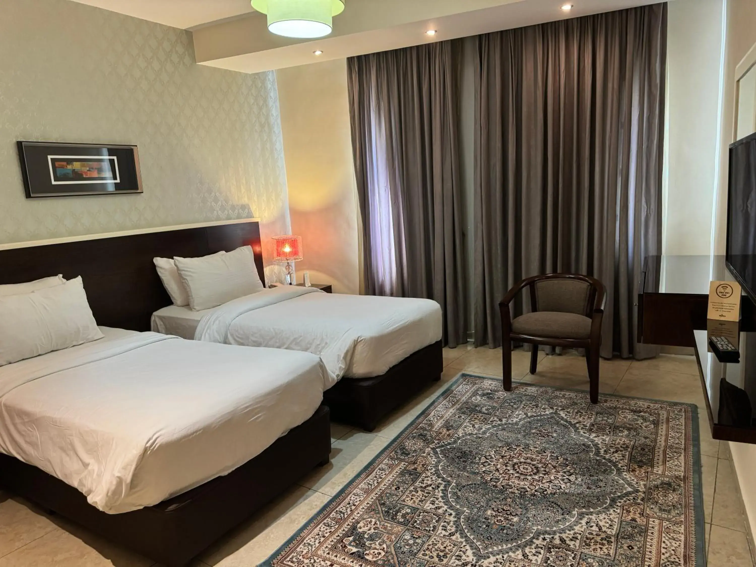 Bed in City Rose Hotel Suites Bed in City Rose Hotel Suites