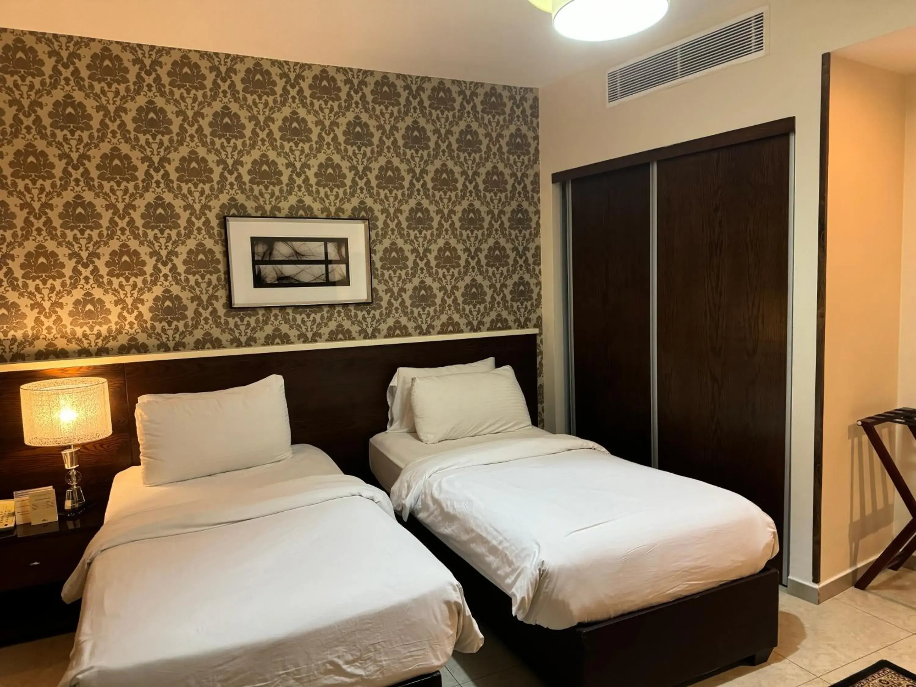 Bed in City Rose Hotel Suites Bed in City Rose Hotel Suites