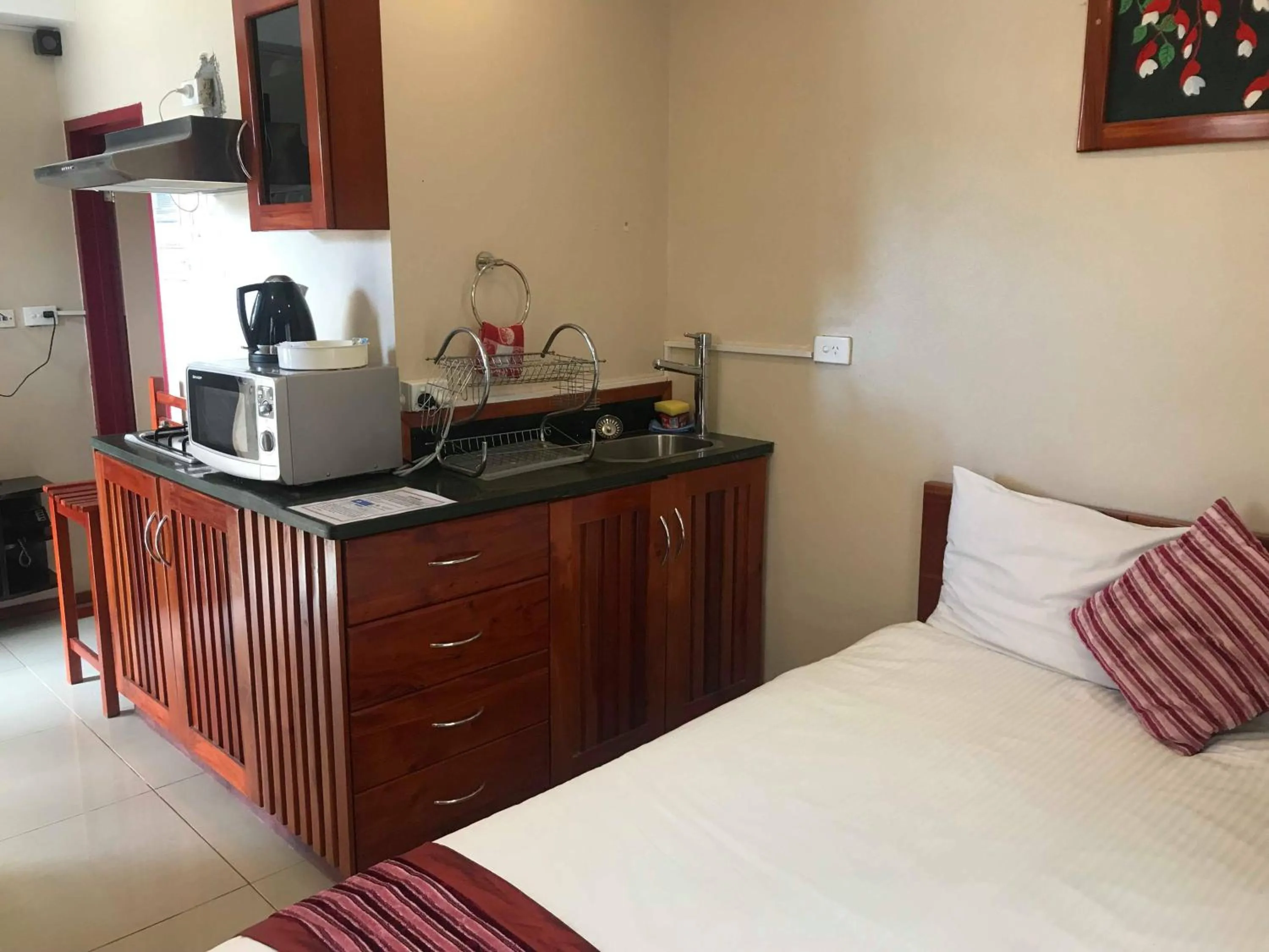 Bed in Al - Minhaj Service Apartments