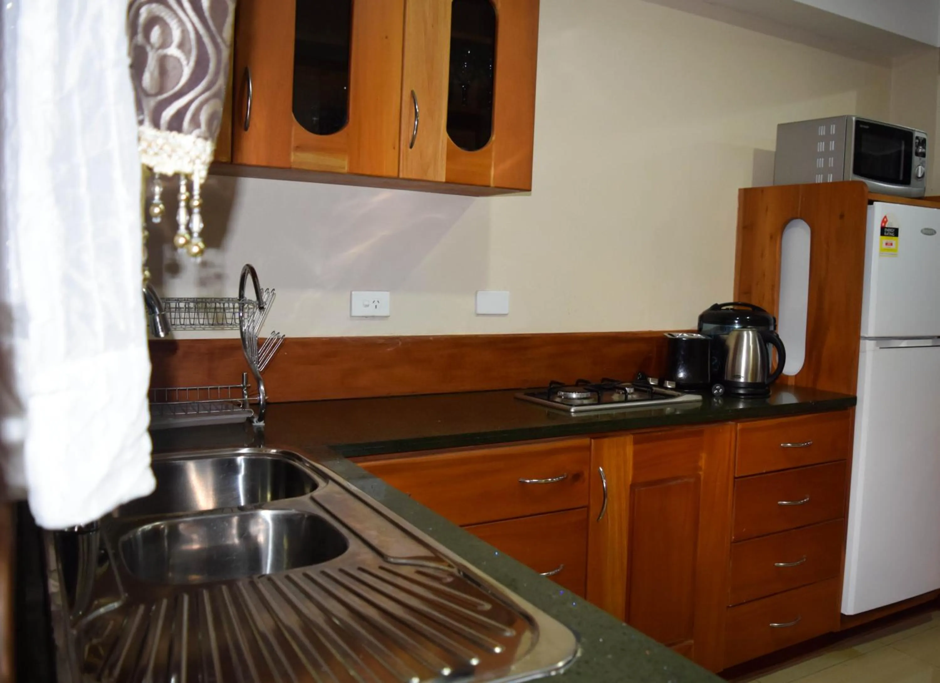 Kitchen or kitchenette in Al - Minhaj Service Apartments