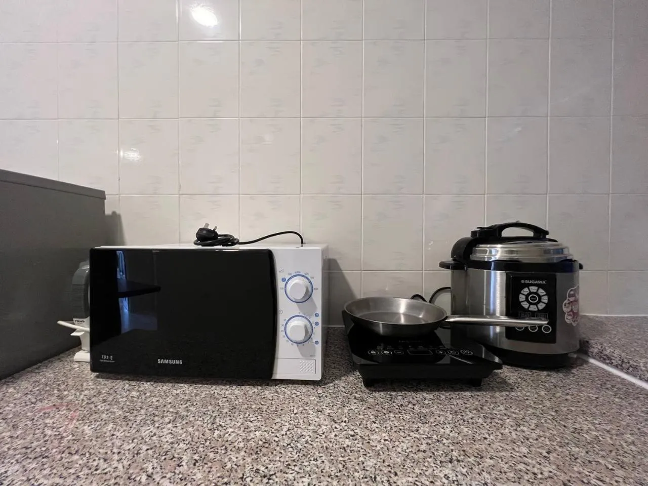 Kitchen or kitchenette in Perdana Serviced Apartment & Resorts