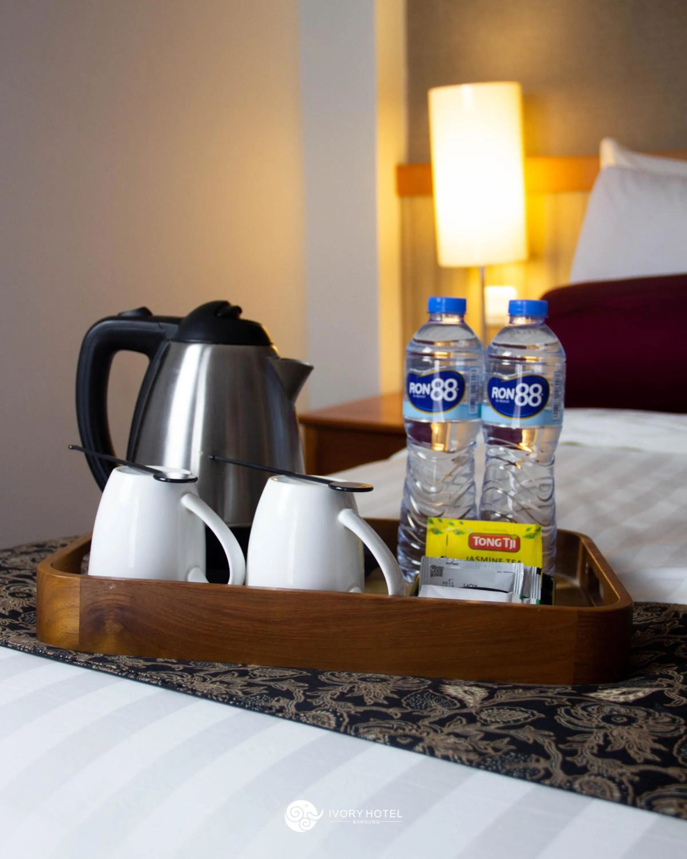 Coffee/tea facilities, Bed in Ivory Hotel Bandung