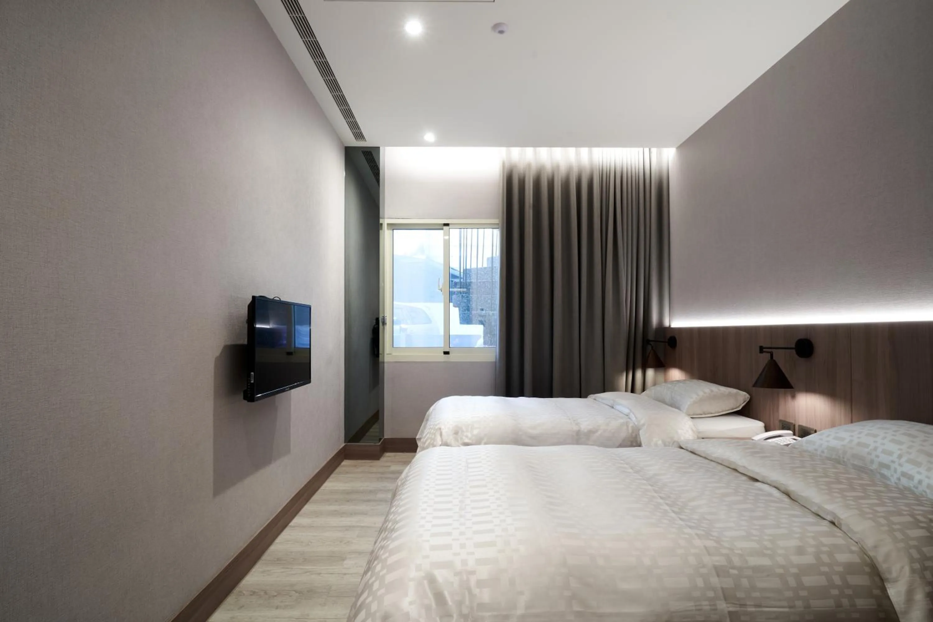 Bed in Yung An Business Hotel