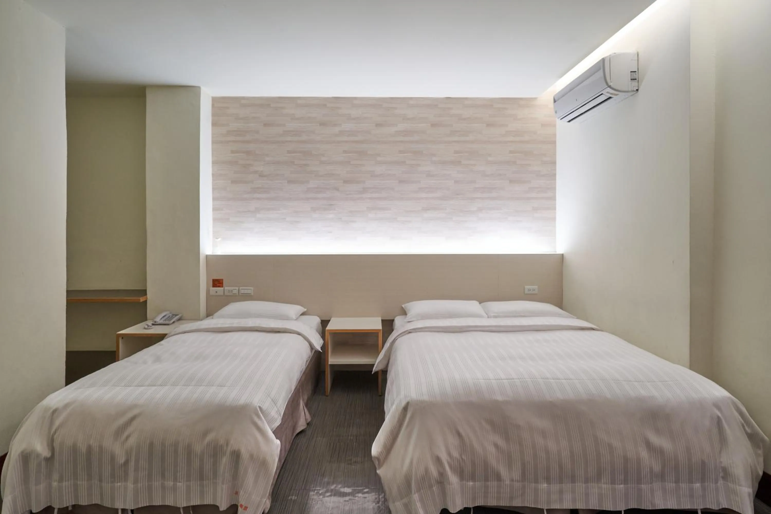 Bed in Yung An Business Hotel