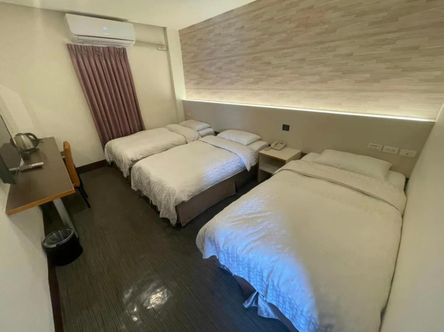 Bed in Yung An Business Hotel