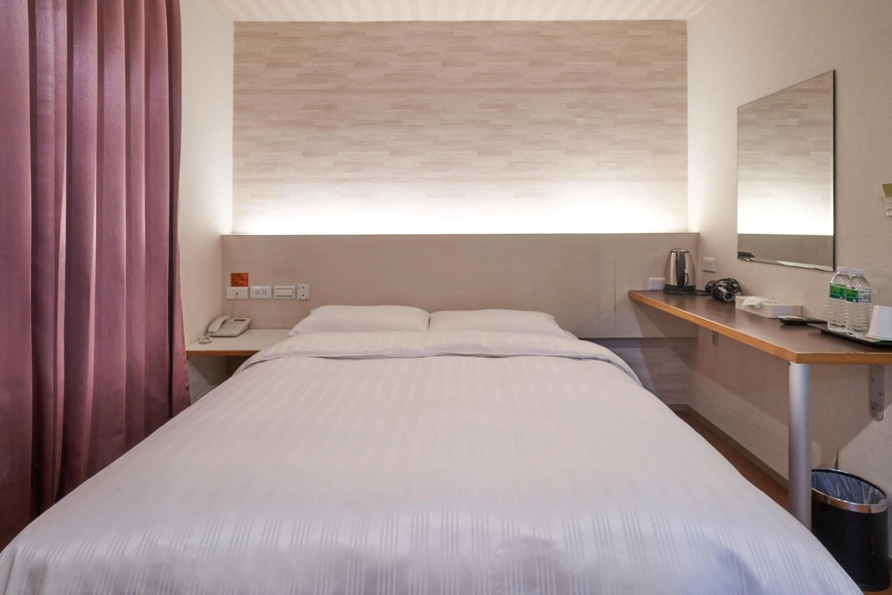 Bed in Yung An Business Hotel