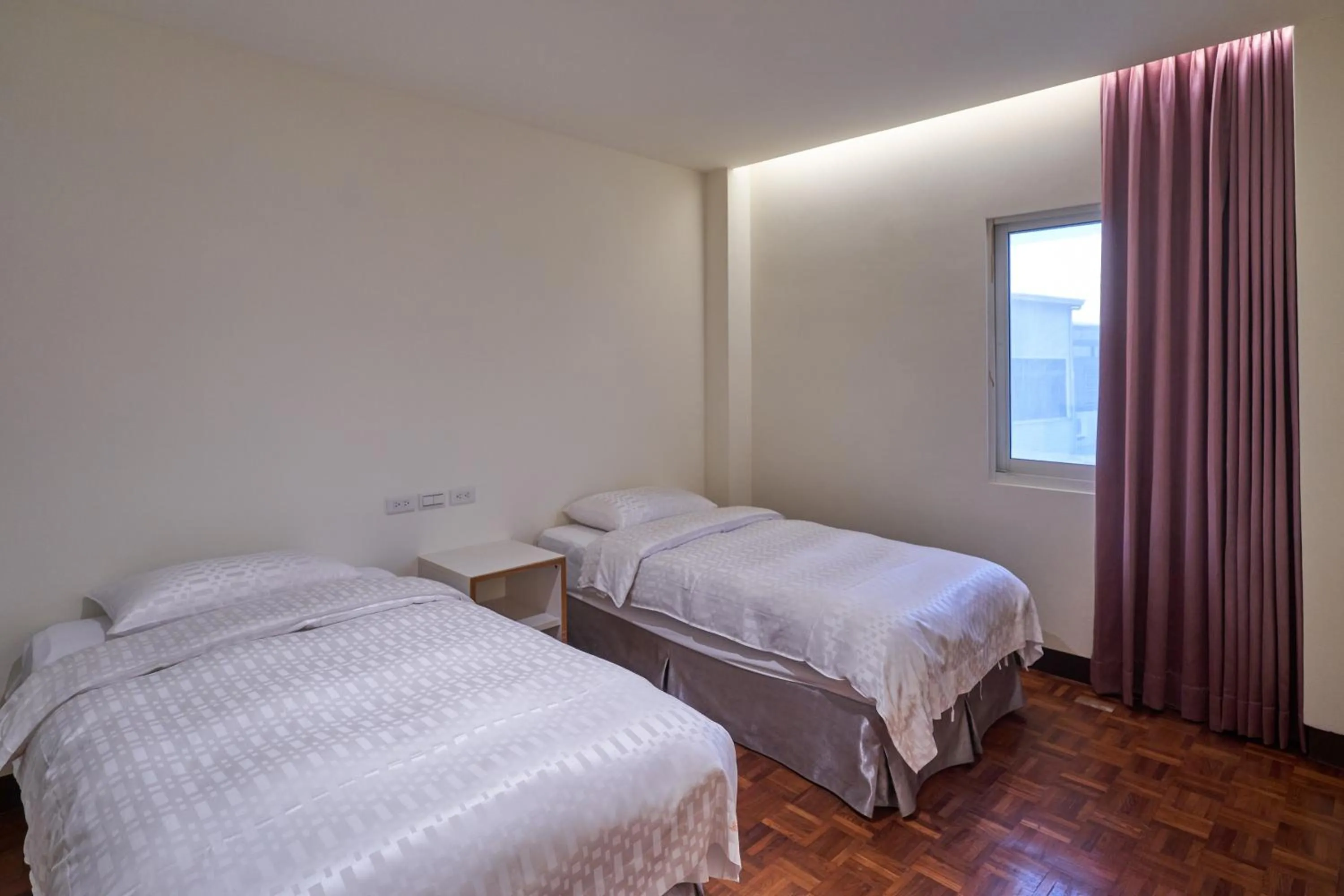 Bed in Yung An Business Hotel