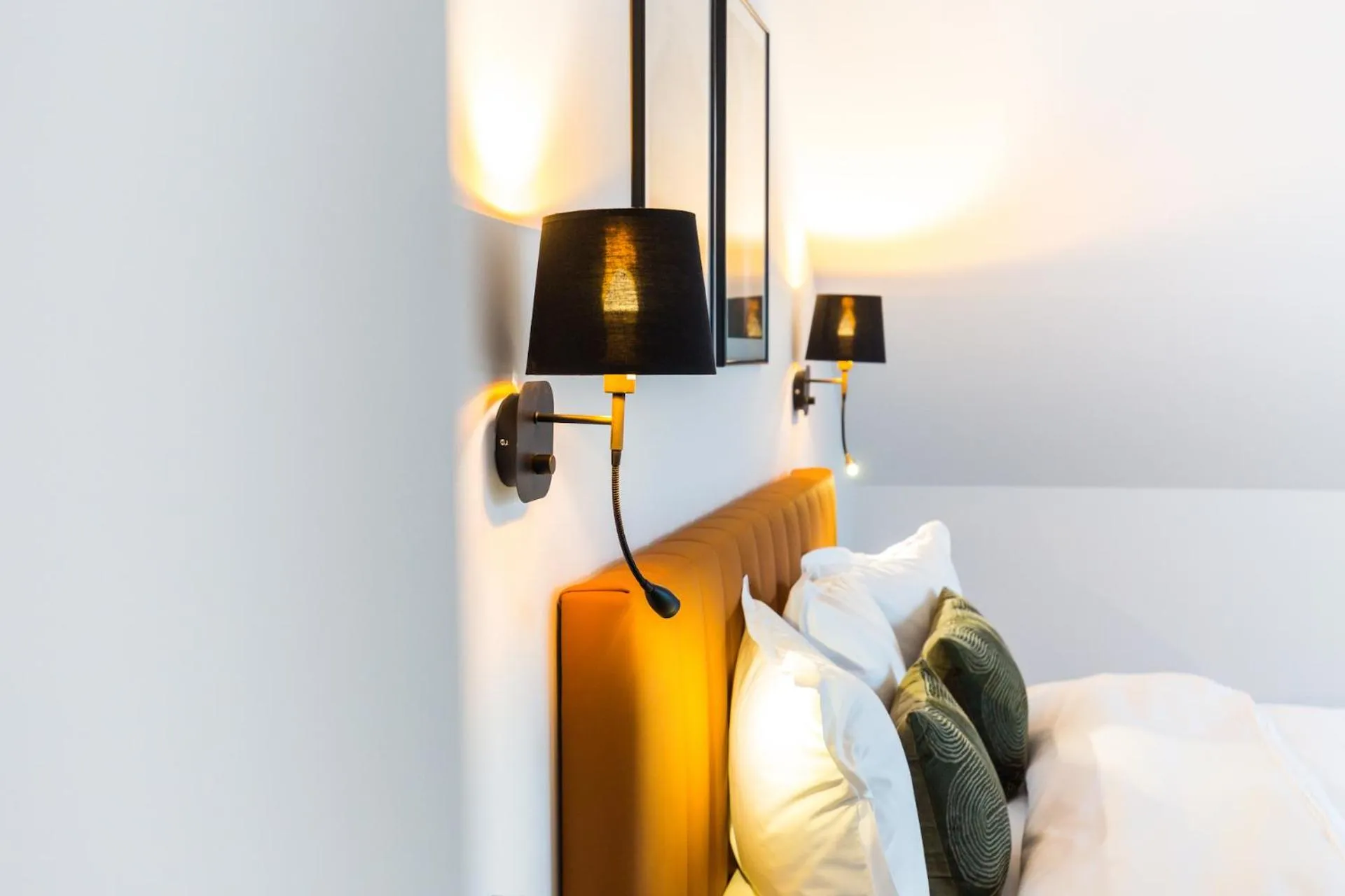 Bed in UpperHouse Suites & More