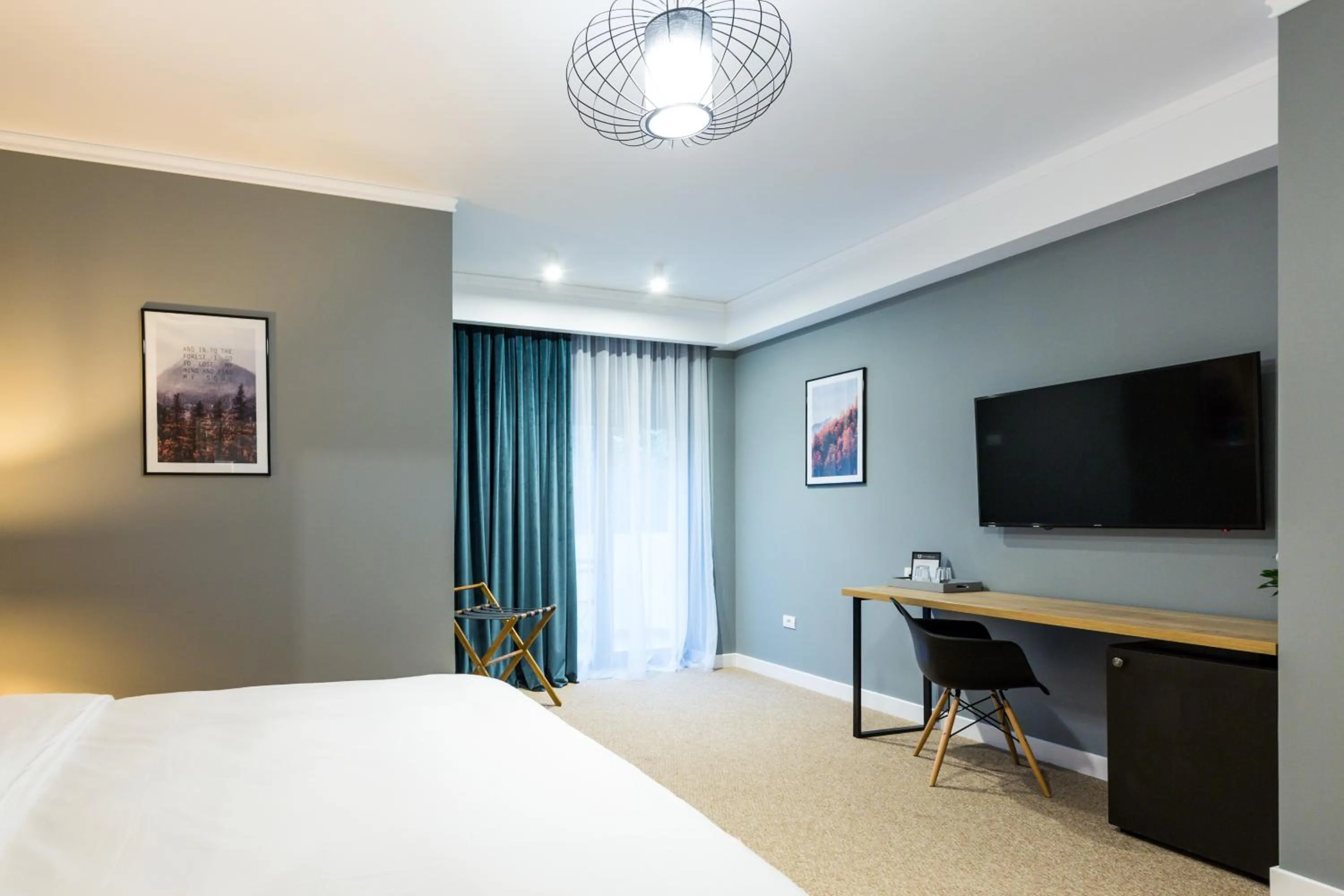 Bed in UpperHouse Suites & More