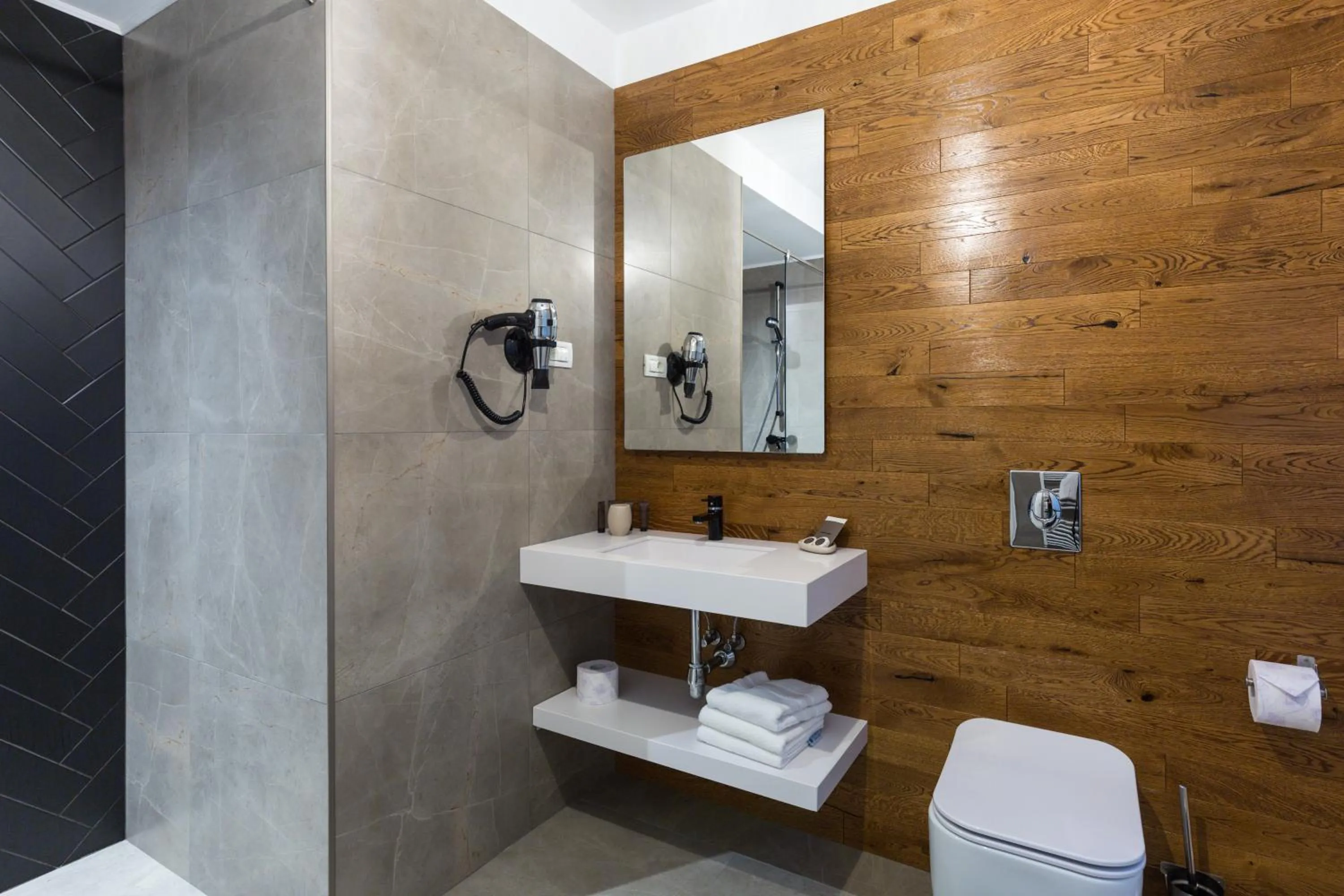 Bathroom in UpperHouse Suites & More