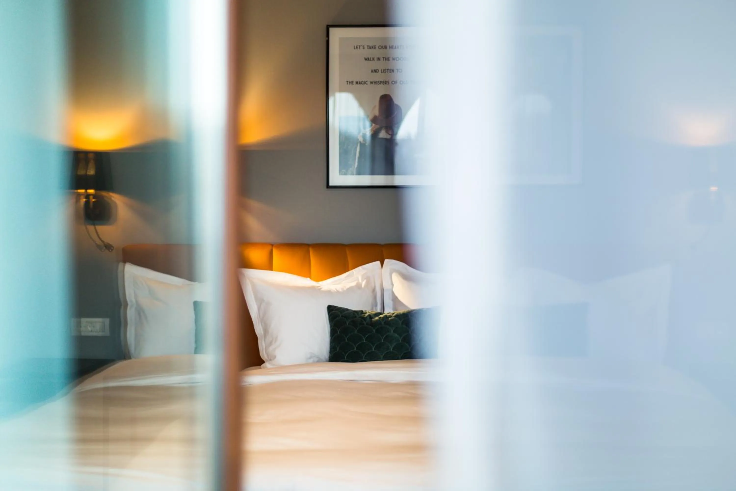 Bedroom, Bed in UpperHouse Suites & More