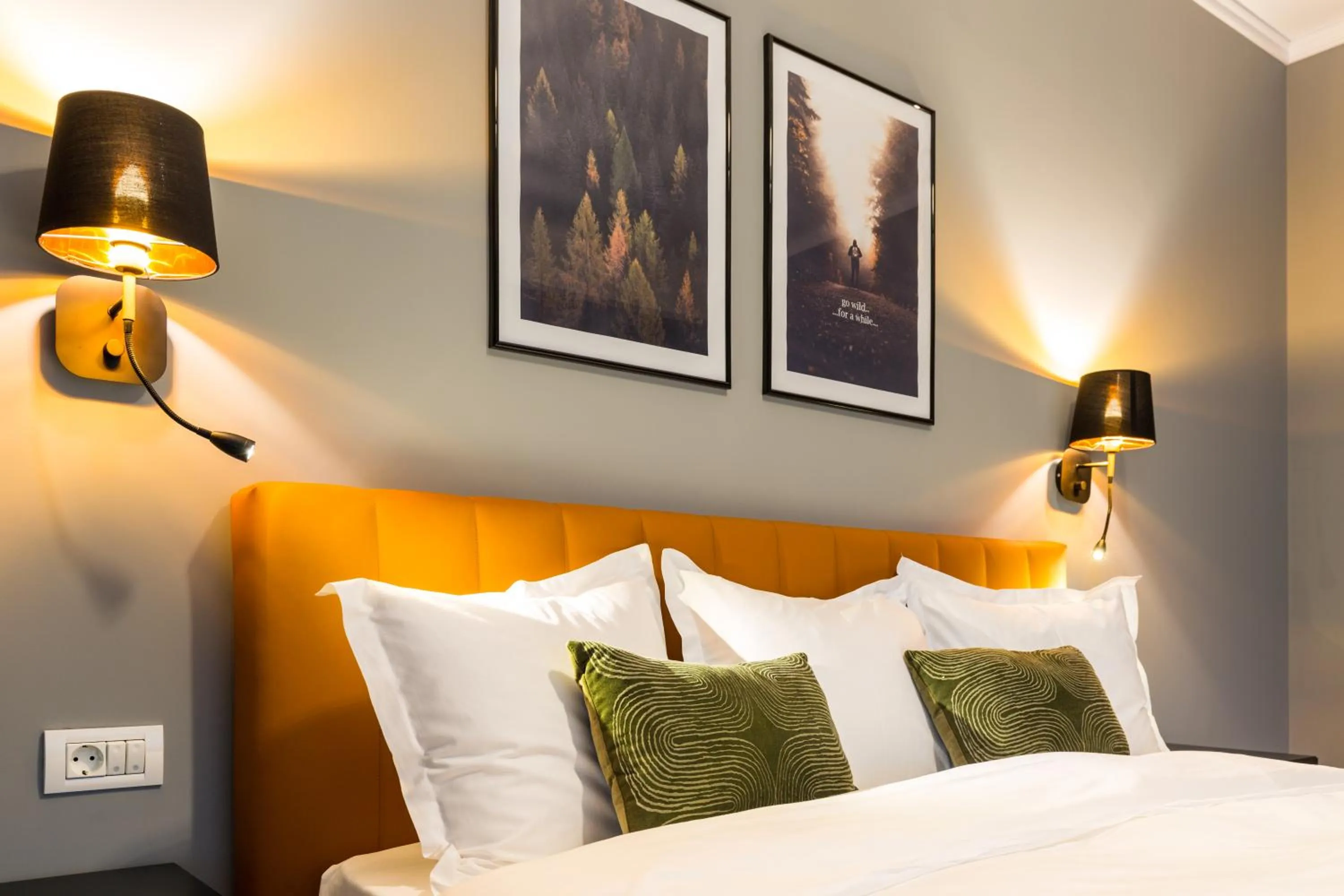 Bed in UpperHouse Suites & More