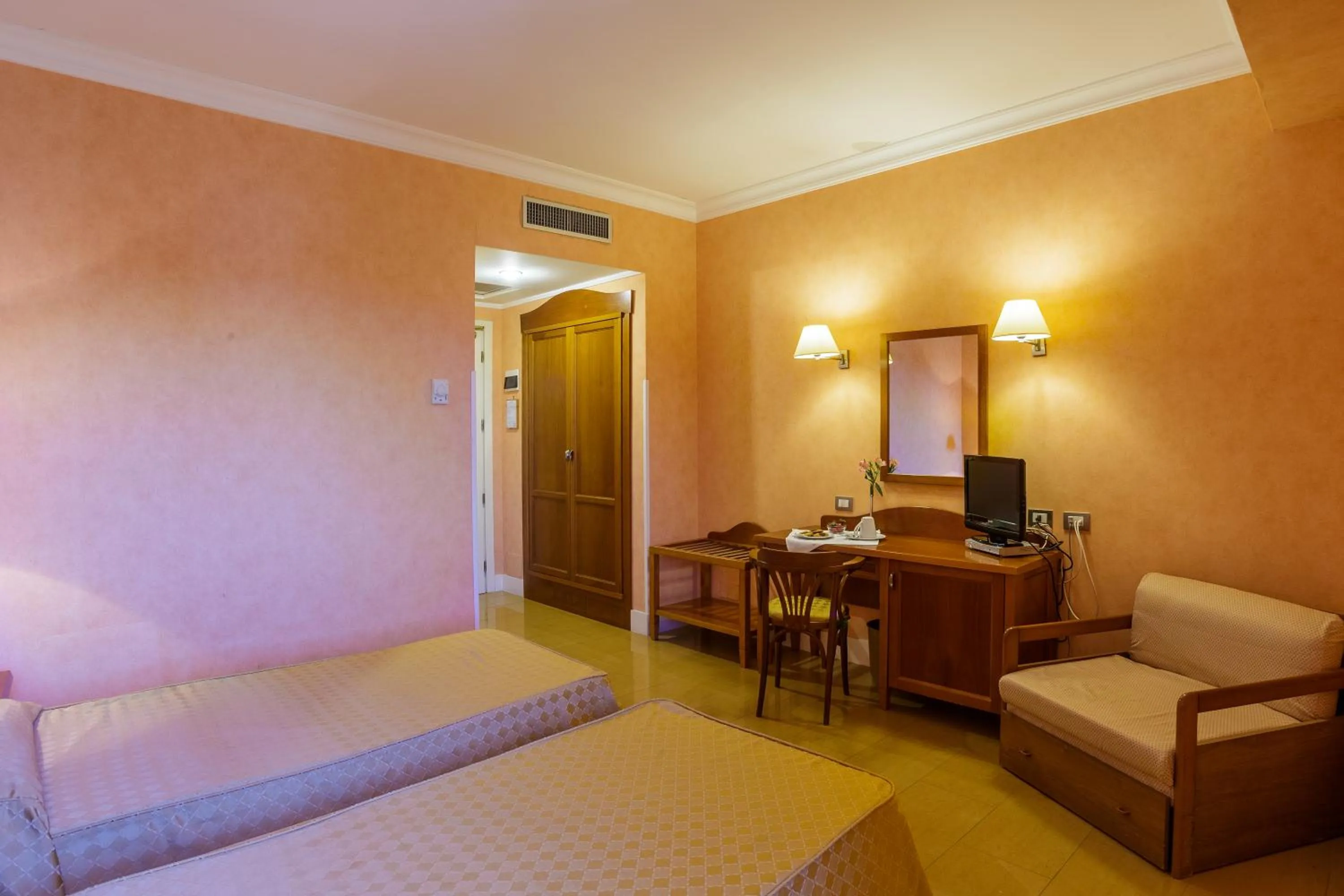 Bed in Hotel Conchiglia d'Oro