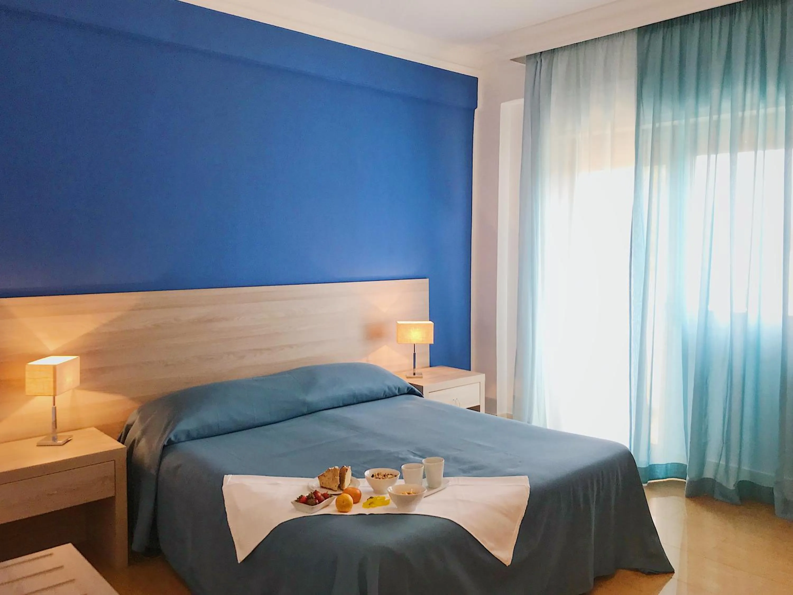 Bed in Hotel Conchiglia d'Oro