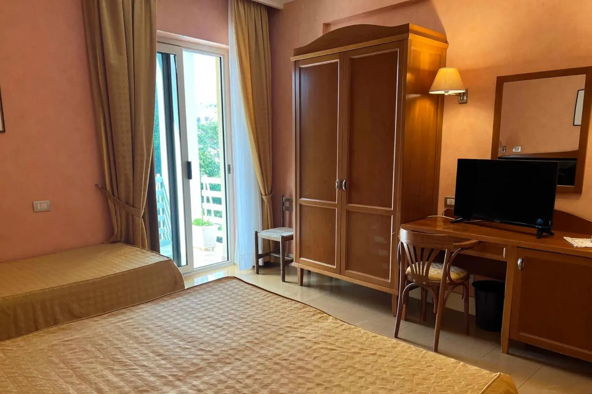 Bed in Hotel Conchiglia d'Oro Bed in Hotel Conchiglia d'Oro