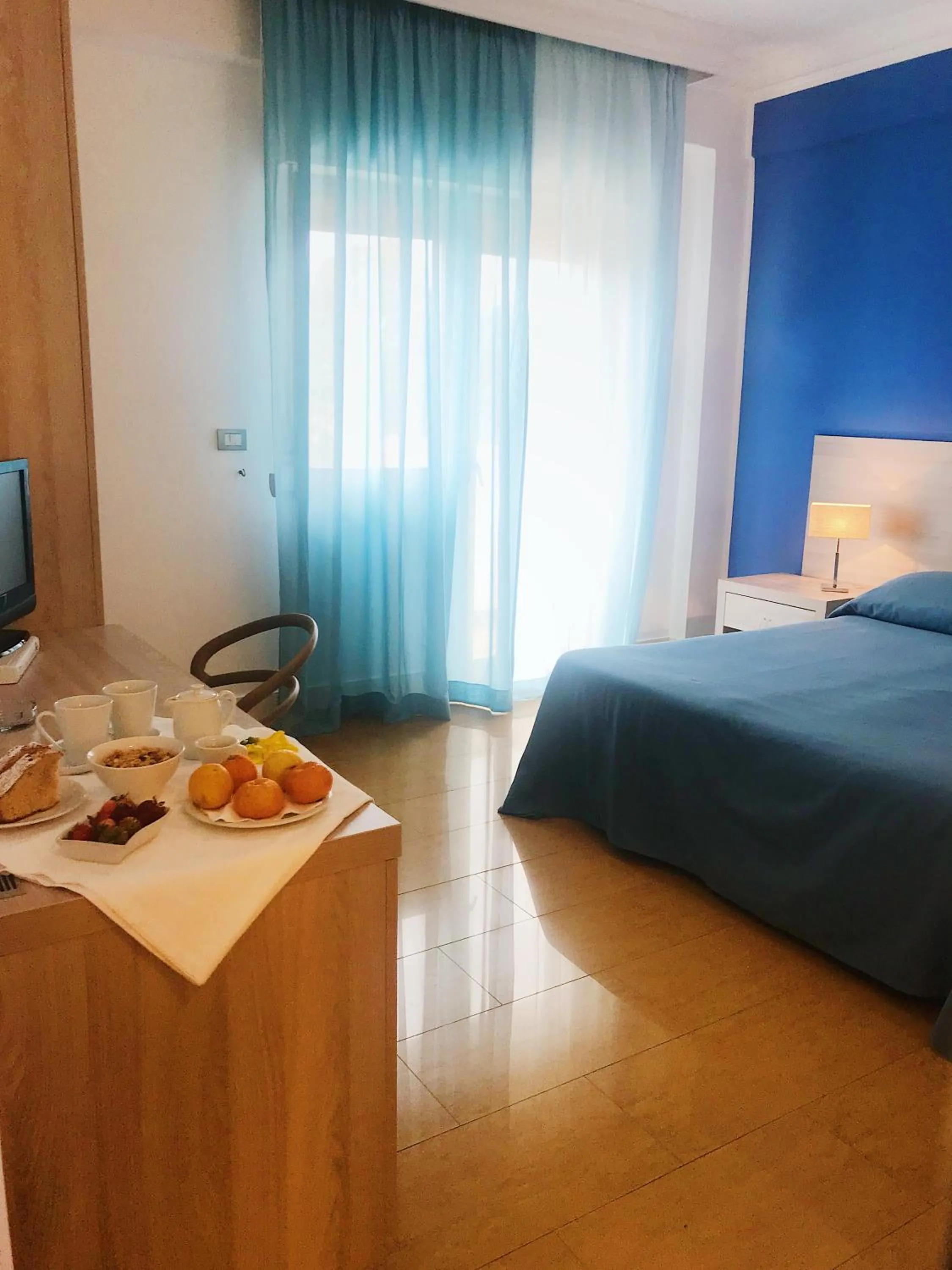 Bed in Hotel Conchiglia d'Oro