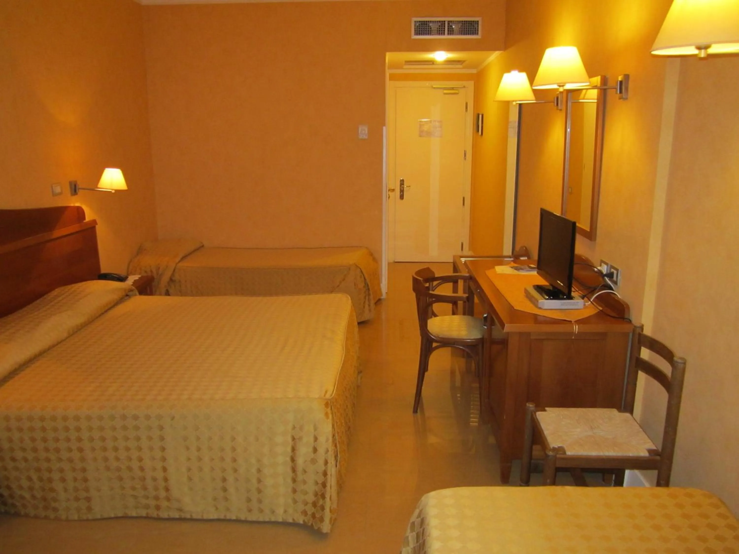 Bed in Hotel Conchiglia d'Oro