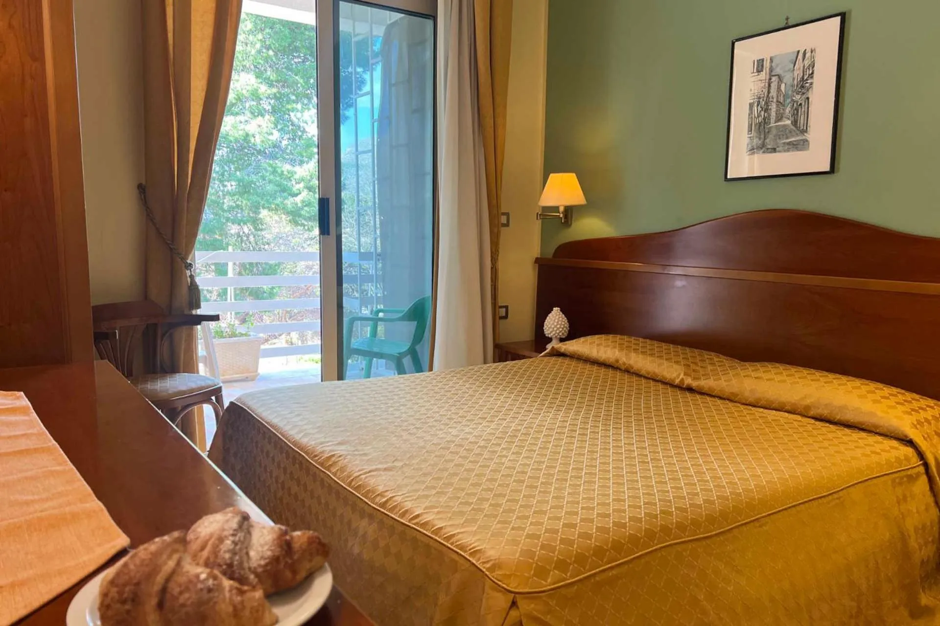 Bed in Hotel Conchiglia d'Oro