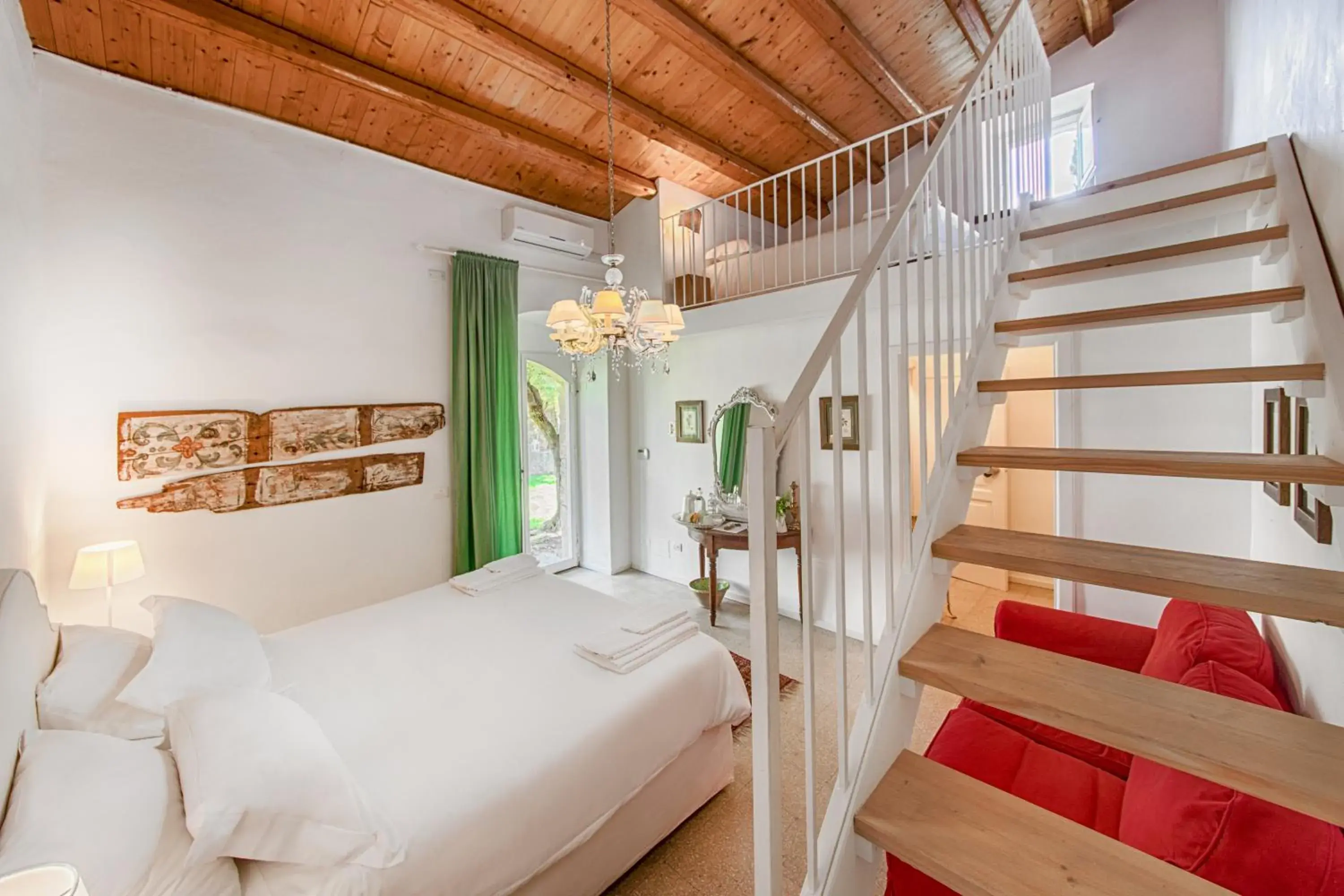Superior Quadruple Room in Baglio Occhipinti Superior Quadruple Room in Baglio Occhipinti