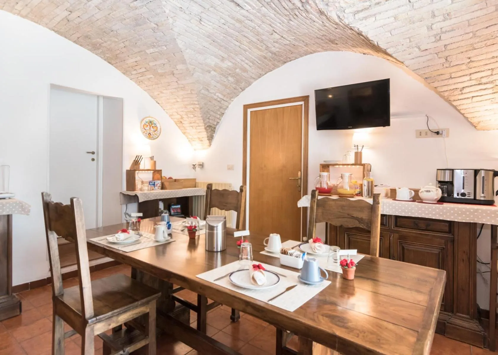 Communal lounge/ TV room in B&B Cantico Delle Creature