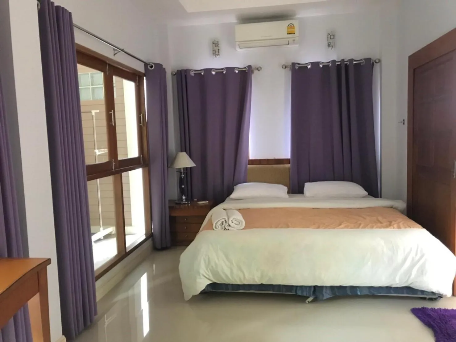 Bed in Damnoen Care Resort