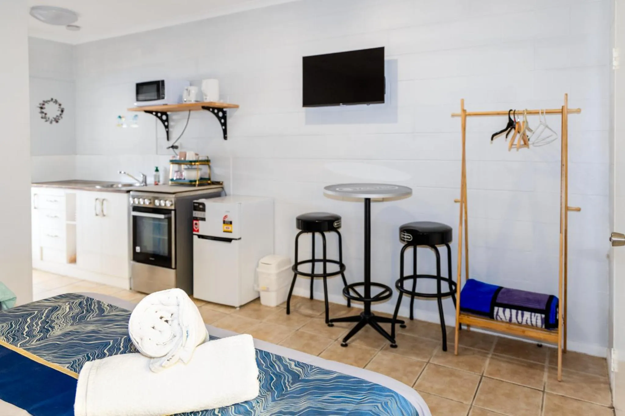 Bed in Innisfail Riverfront Motel