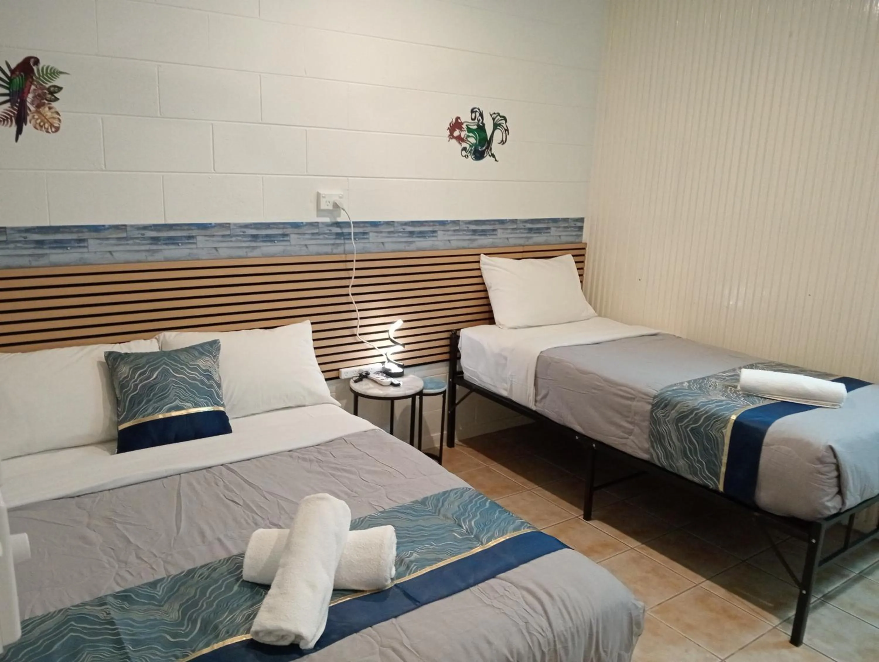 Bed in Innisfail Riverfront Motel