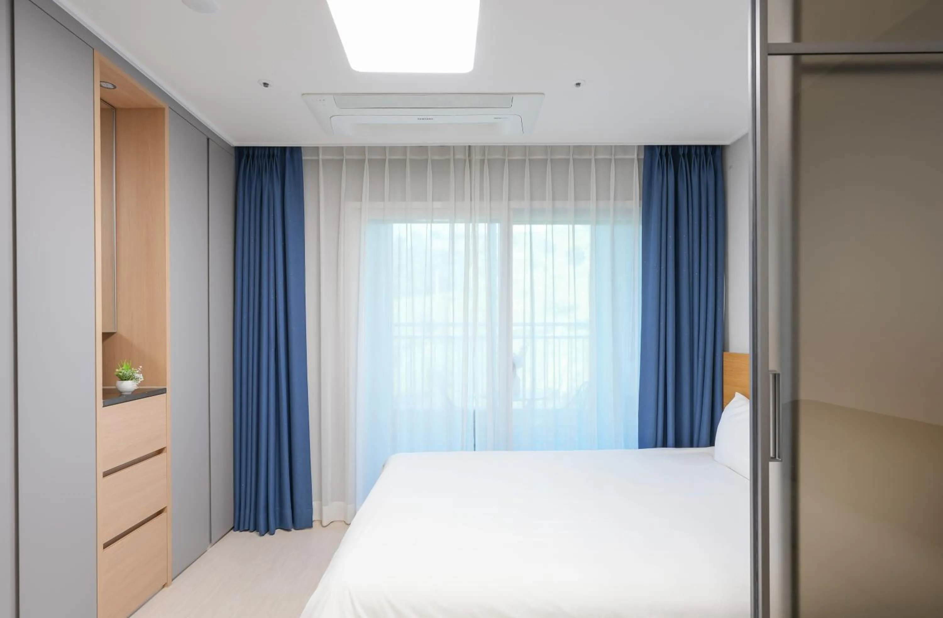 Bed in Firstcity Hotel YEOSU