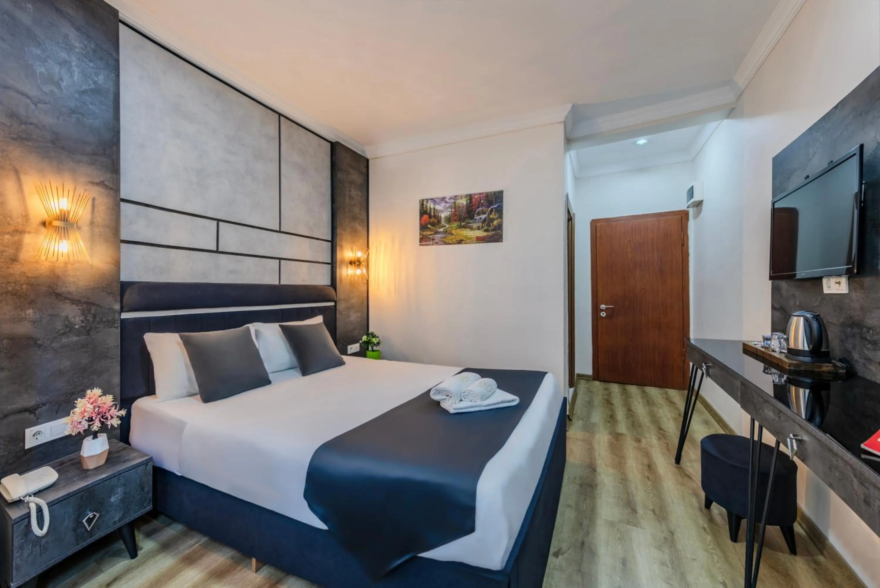 Bed in La Pazza Suites