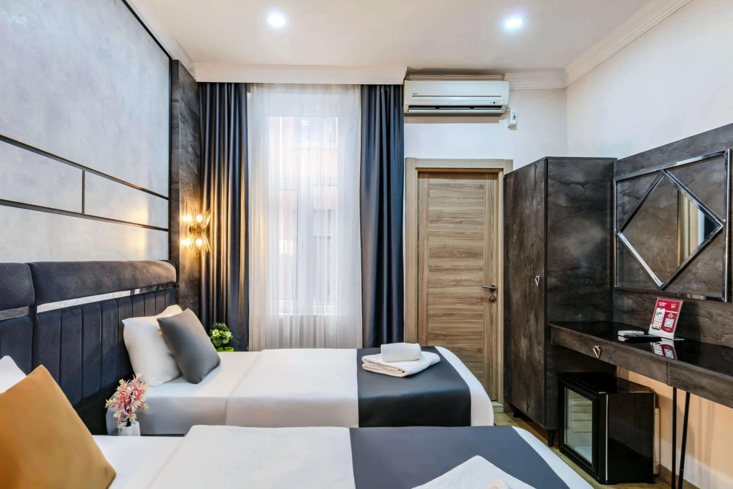 Bed in La Pazza Suites