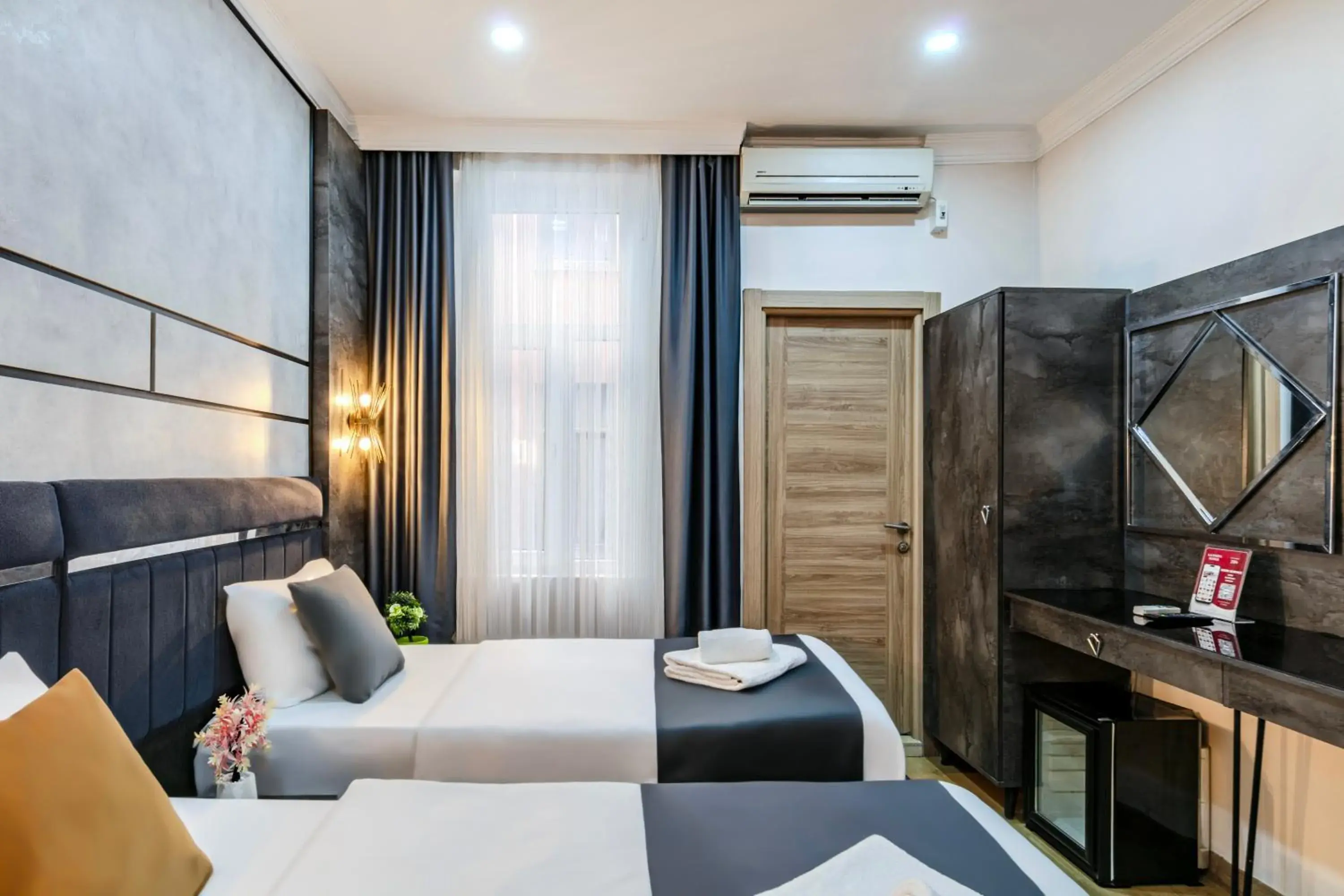 Bed in La Pazza Suites Bed in La Pazza Suites