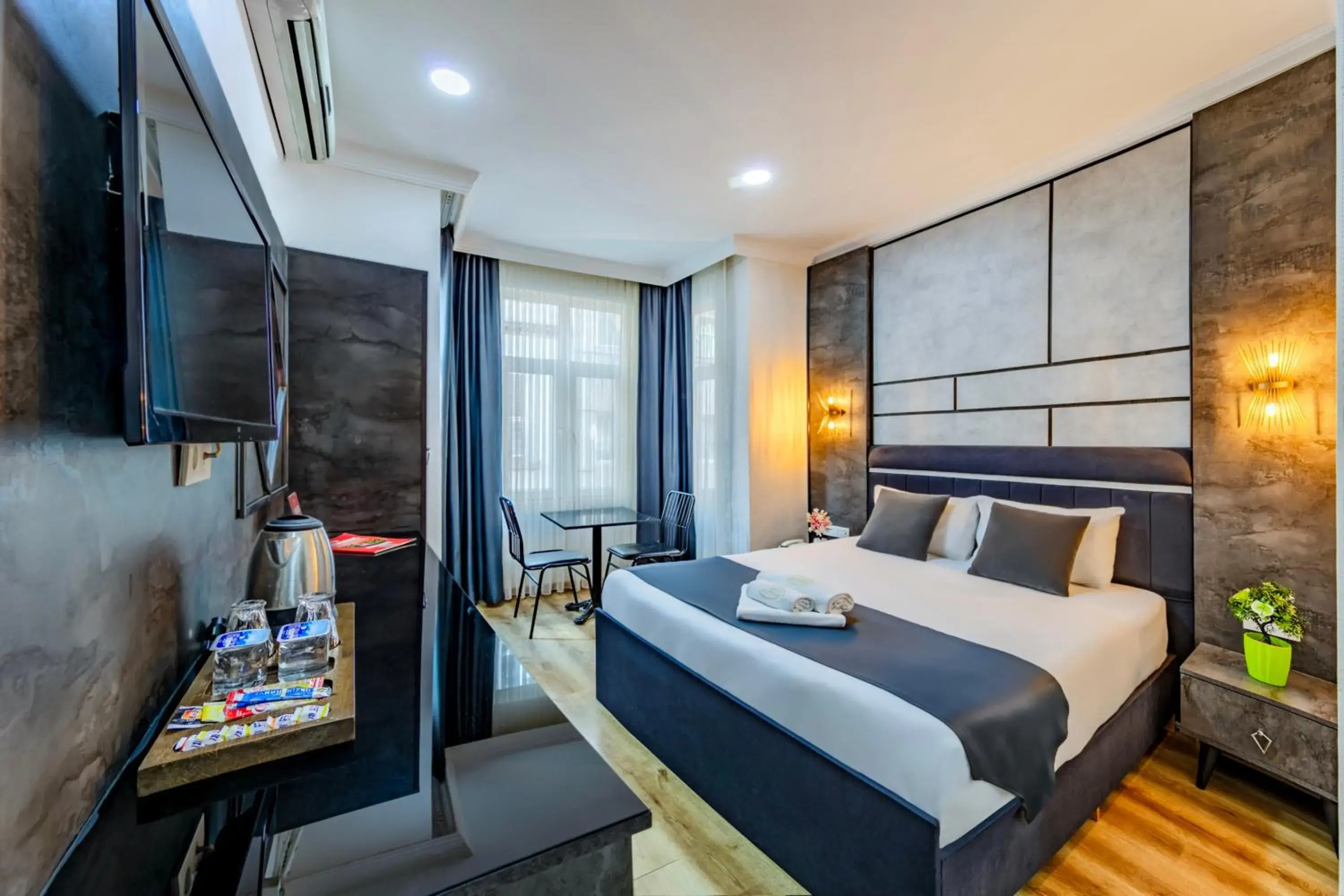 Bed in La Pazza Suites Bed in La Pazza Suites