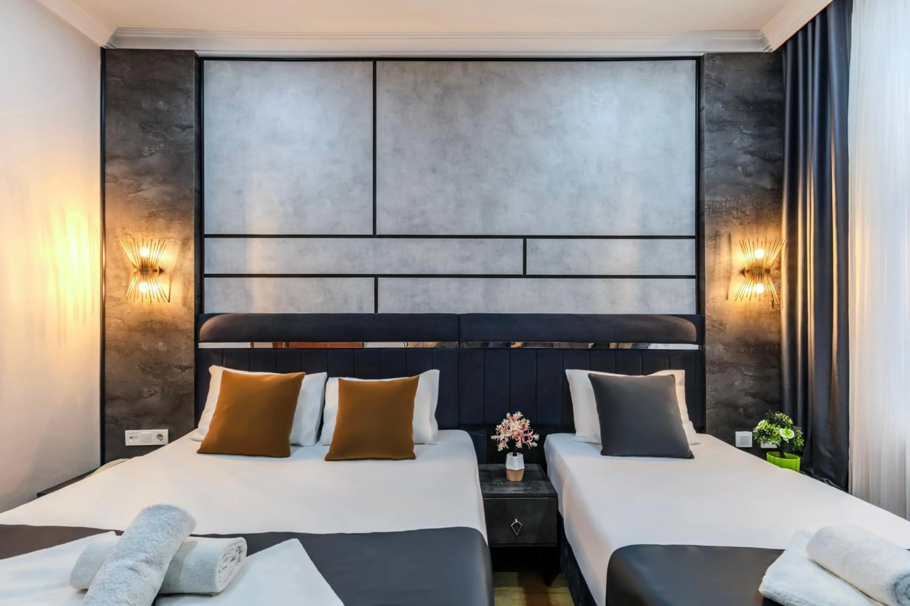 Bed in La Pazza Suites